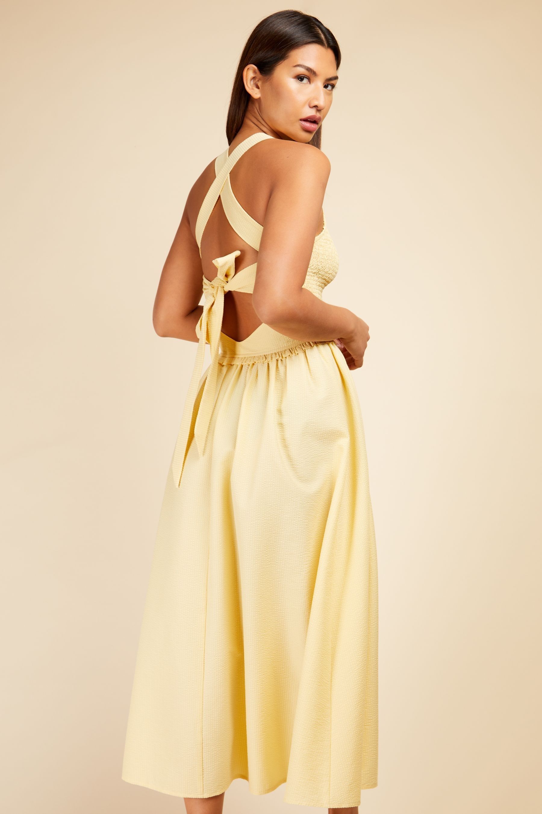 Buy Little Mistress Yellow Butter Shirred Midaxi Dress from Next Luxembourg