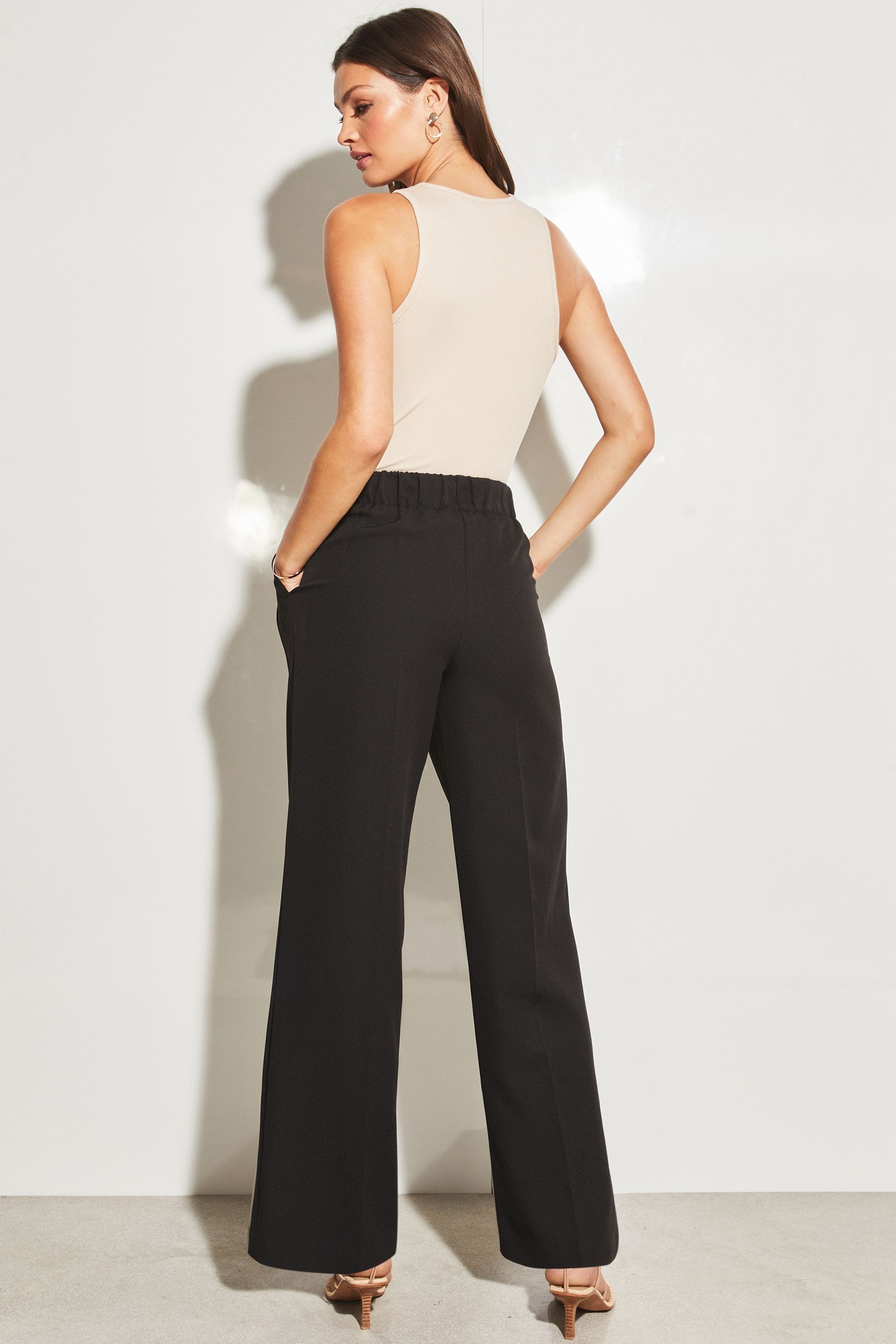 Buy Lipsy Black Relaxed Wide Leg Tailored Trousers from Next Oman
