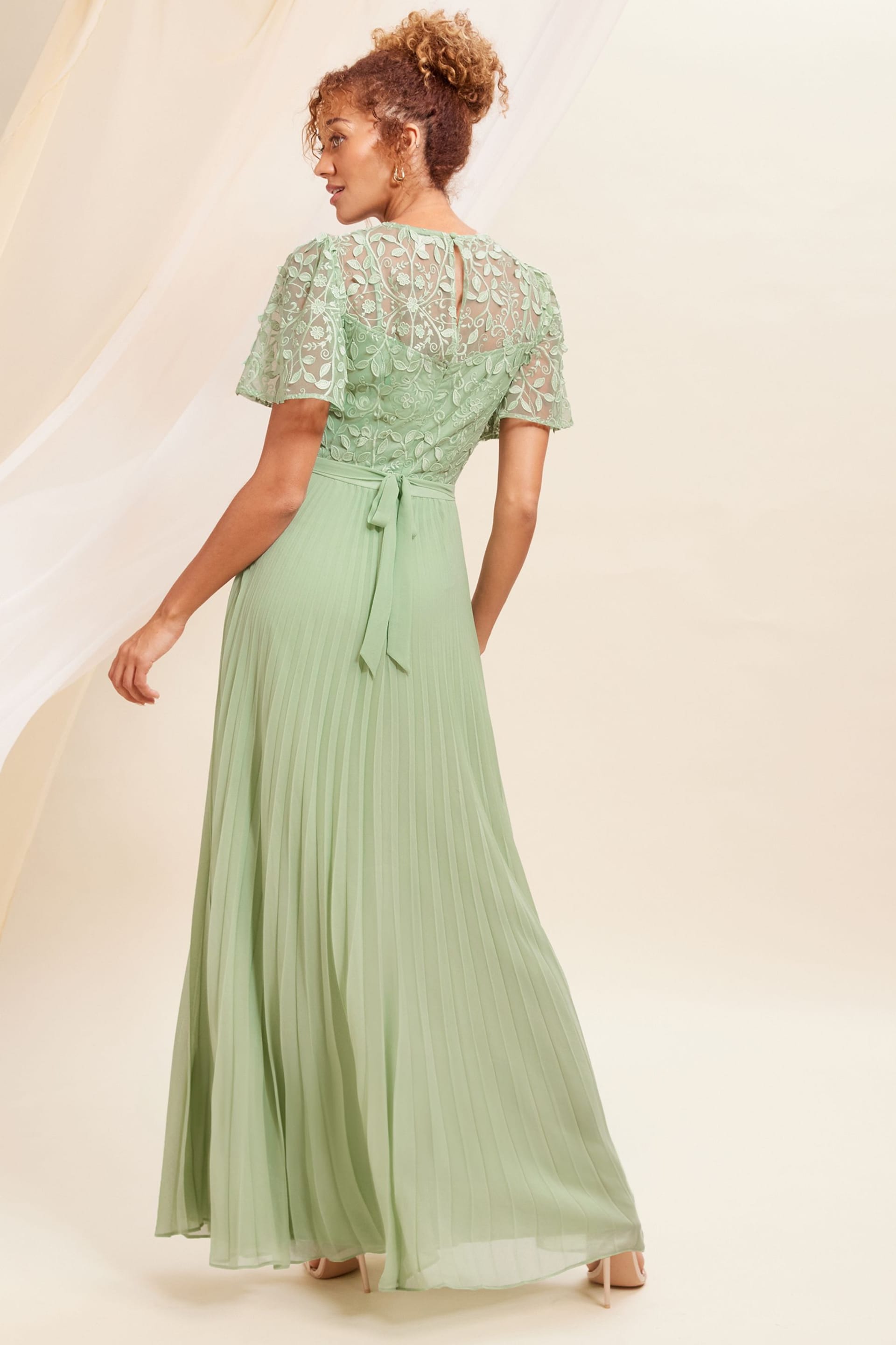 Love & Roses Sage Green Embroidered Flutter Sleeve Pleated Maxi Bridesmaid Dress - Image 3 of 4