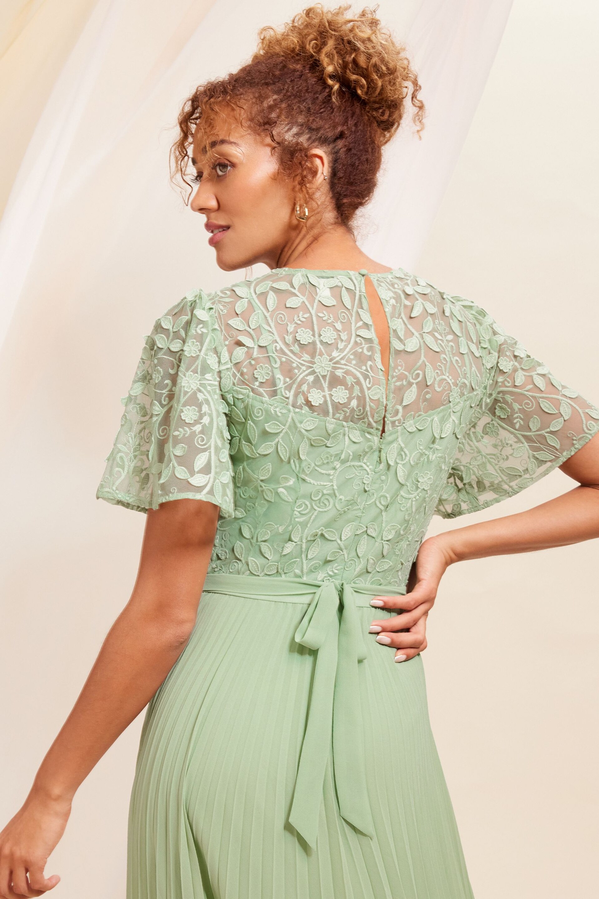 Love & Roses Sage Green Embroidered Flutter Sleeve Pleated Maxi Bridesmaid Dress - Image 4 of 4