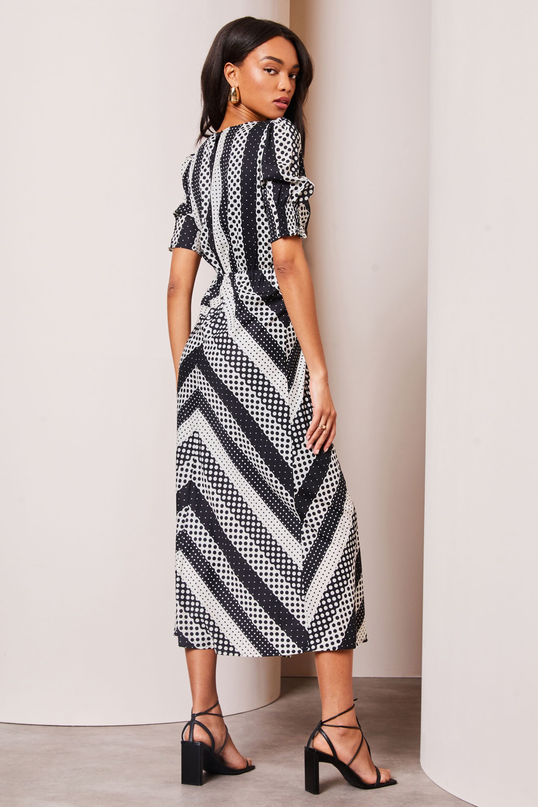 Buy Lipsy Black V Neck Spot Short Sleeve Midi Dress from Next Luxembourg