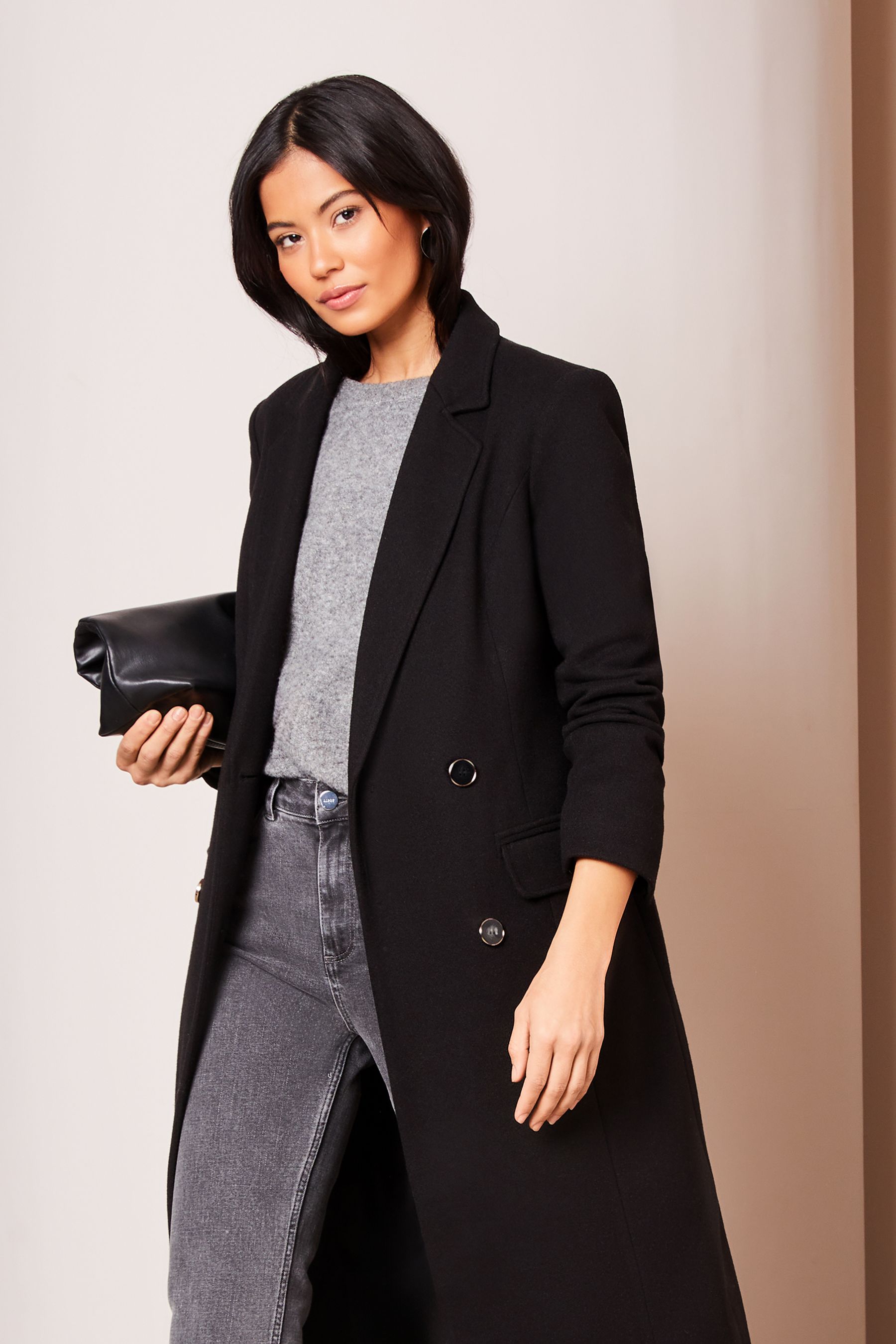 Fitted black coat top