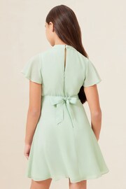 Lipsy Sage Green Twist Neck Flower Waist Occasion Dress (2-16yrs) - Image 3 of 4