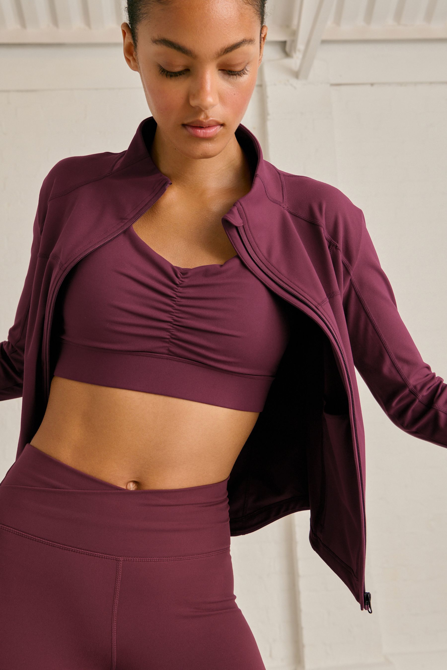 Buy Burgundy Red Active Sculpting Long Sleeve Zip Through Jacket from the Next UK online shop