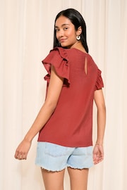 Friends Like These Rust Red Double Ruffle Short Sleeve Top - Image 4 of 4