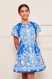 Lipsy Blue/White Print Puff Sleeve Scuba Occasion Dress (5-16yrs) - Image 1 of 4