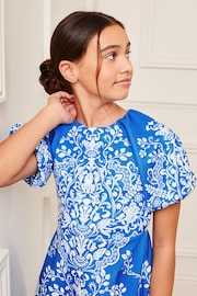 Lipsy Blue/White Print Puff Sleeve Scuba Occasion Dress (5-16yrs) - Image 2 of 4