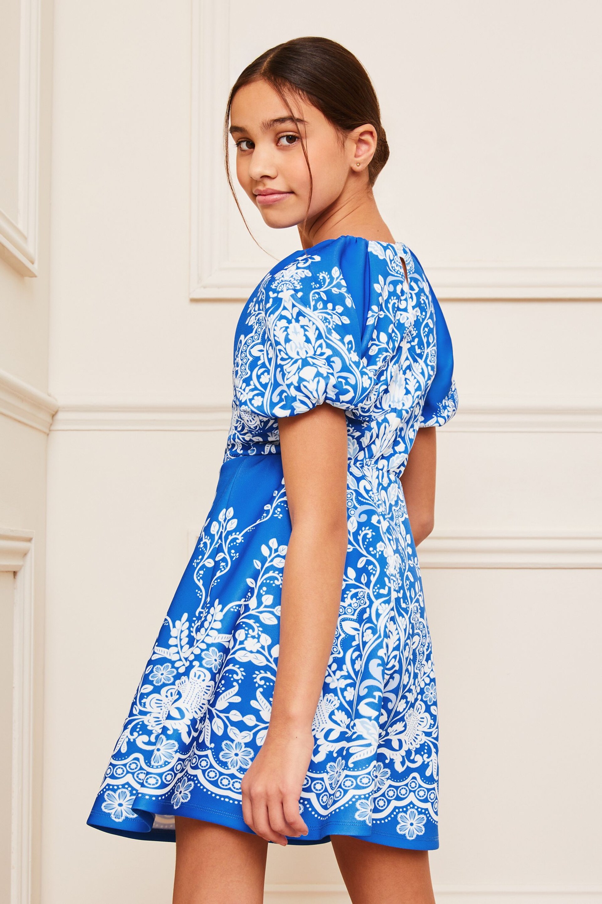 Lipsy Blue/White Print Puff Sleeve Scuba Occasion Dress (5-16yrs) - Image 3 of 4