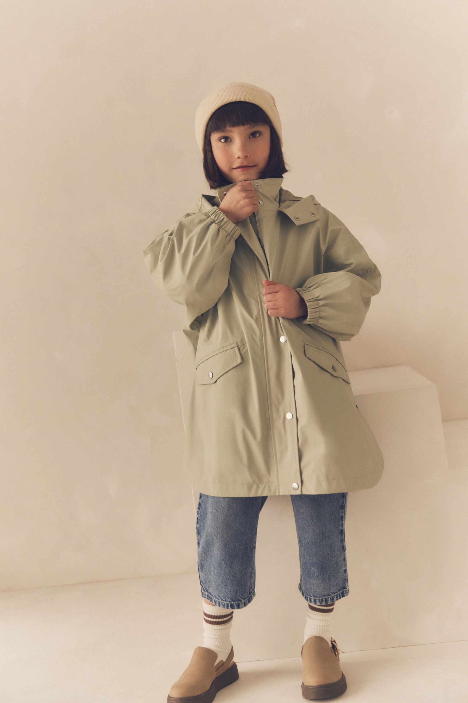 Next rubber coat shop