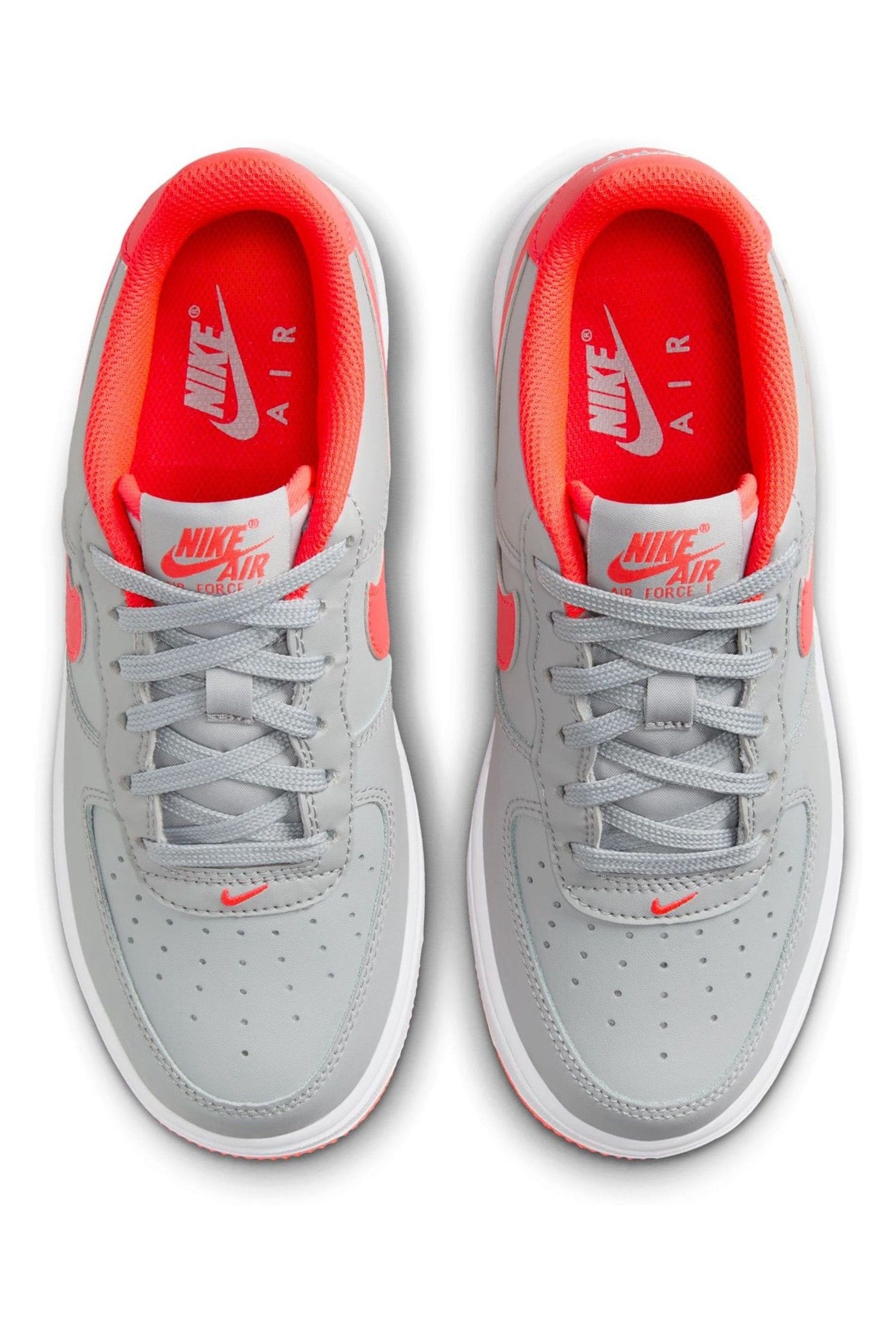 Buy Nike Orange Grey Air Force 1 Youth Trainers from Next Germany