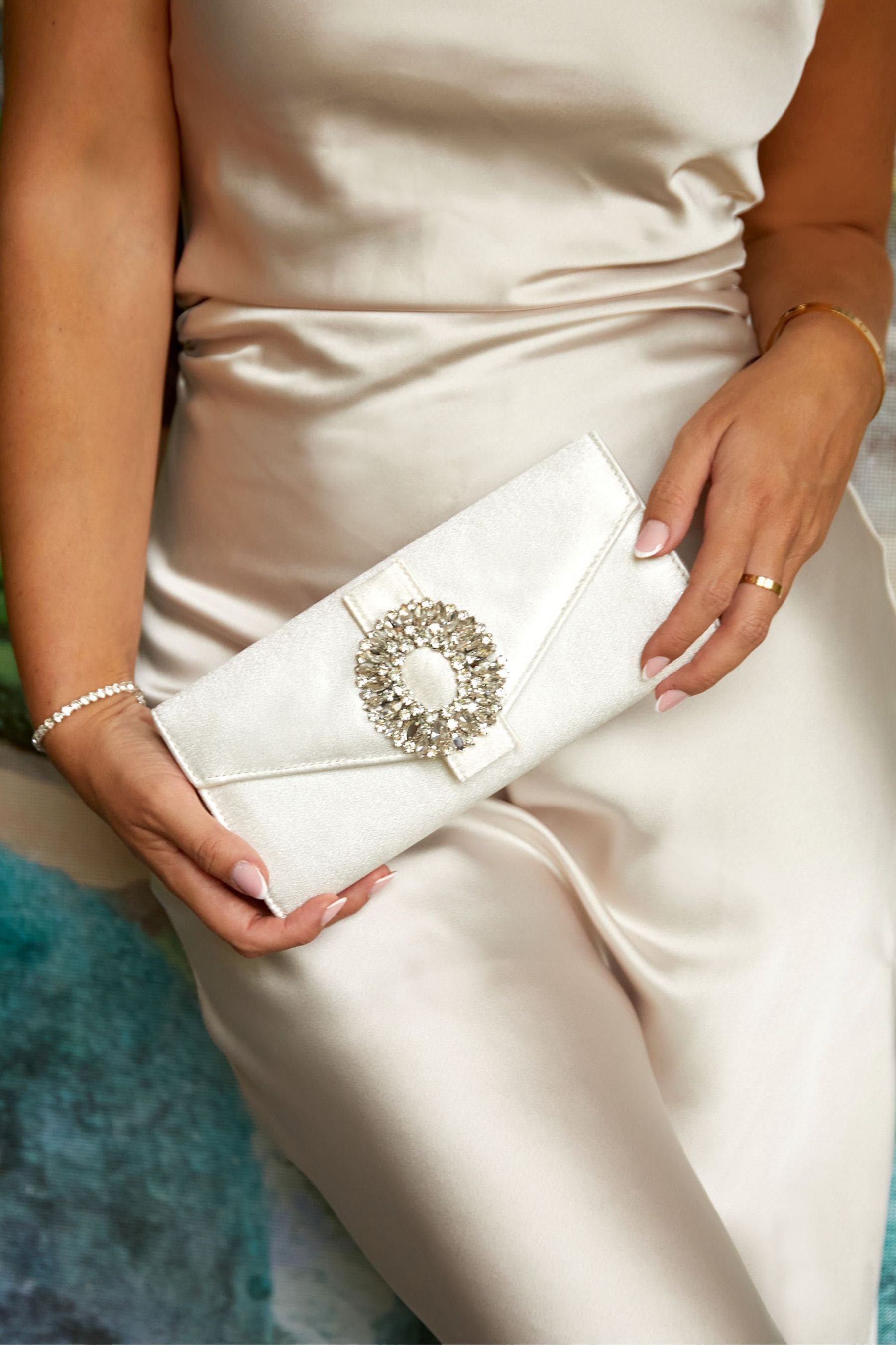 White envelope clutch bag on sale