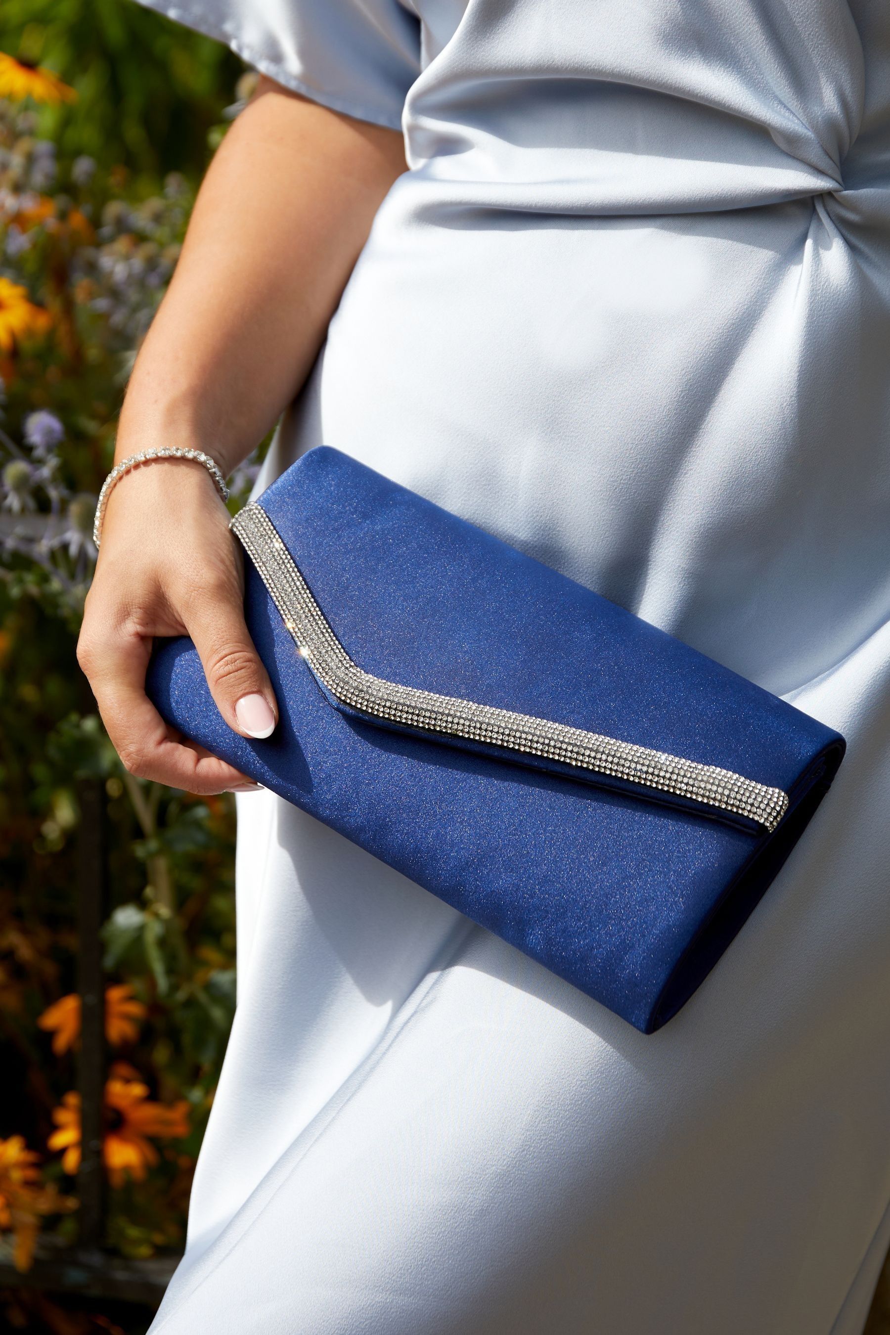 Next blue clutch bag hotsell