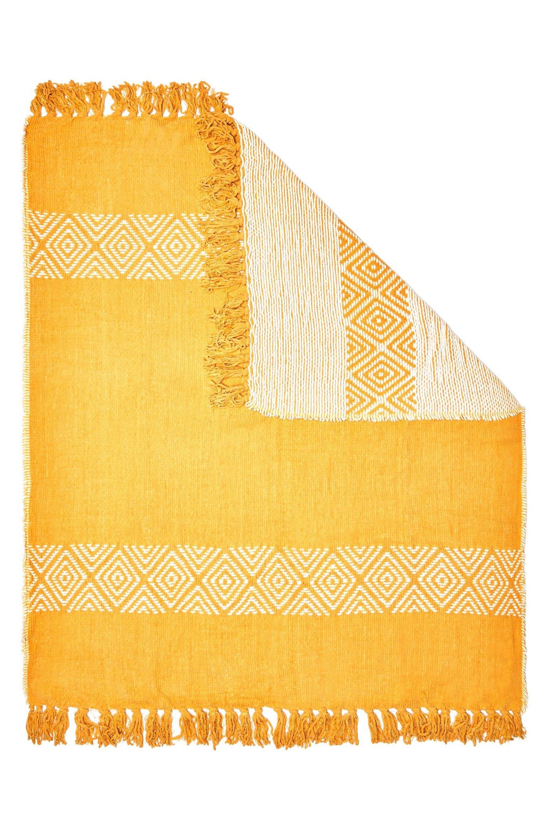 Next yellow throw online