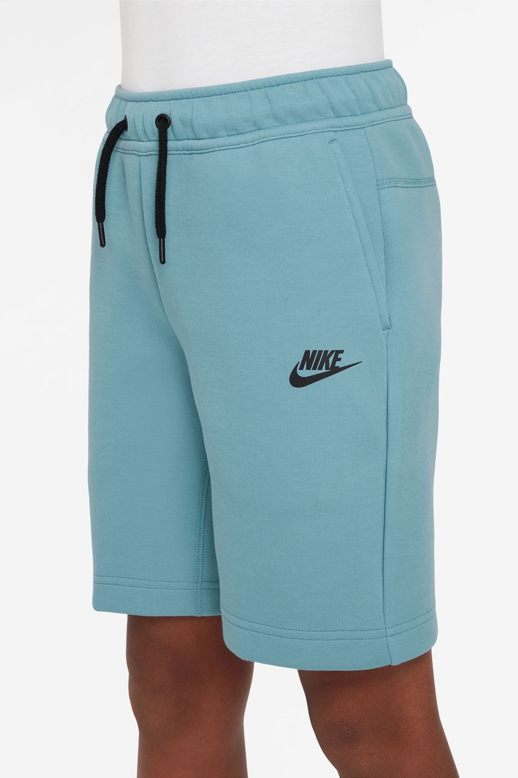 Buy Nike Turquoise Tech Fleece Shorts from the Next UK online shop