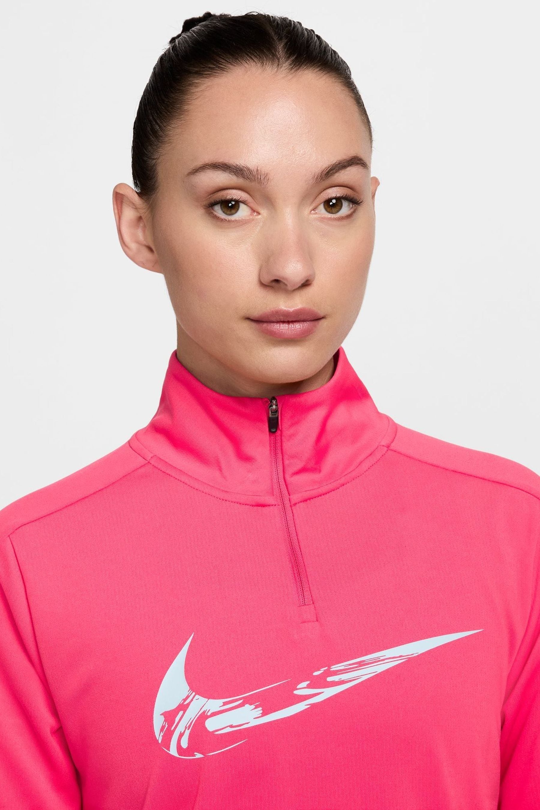 Buy Nike Bright Pink Swoosh Half Zip Long Sleeve Running Top from the Next UK online shop