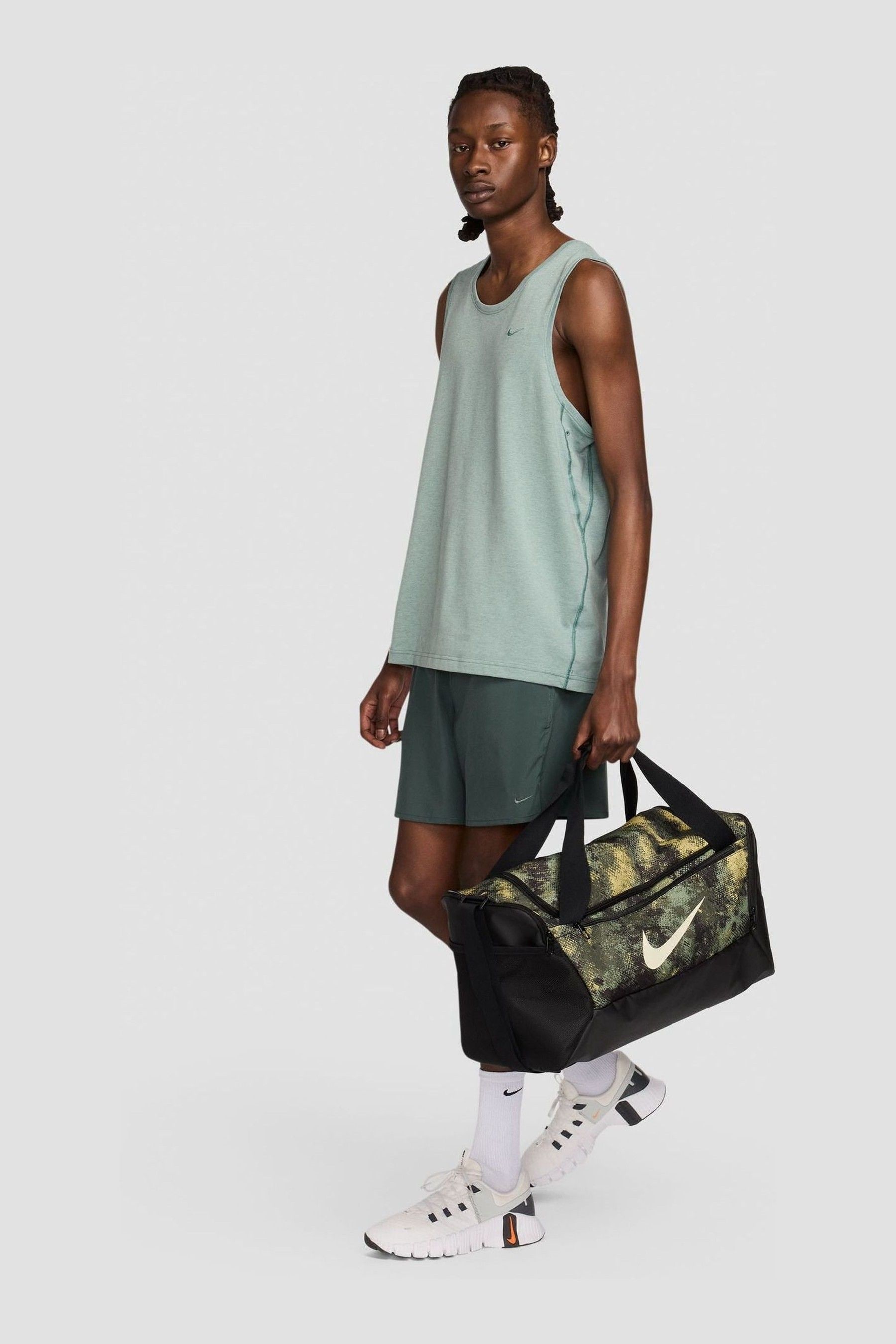 Buy Nike Green Small Brasilia Duffel Bag 41L from Next Gibraltar