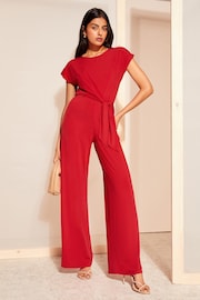 Friends Like These Red Short Sleeve Tie Waist Jumpsuit - Image 1 of 4