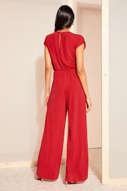 Friends Like These Red Short Sleeve Tie Waist Jumpsuit - Image 4 of 4