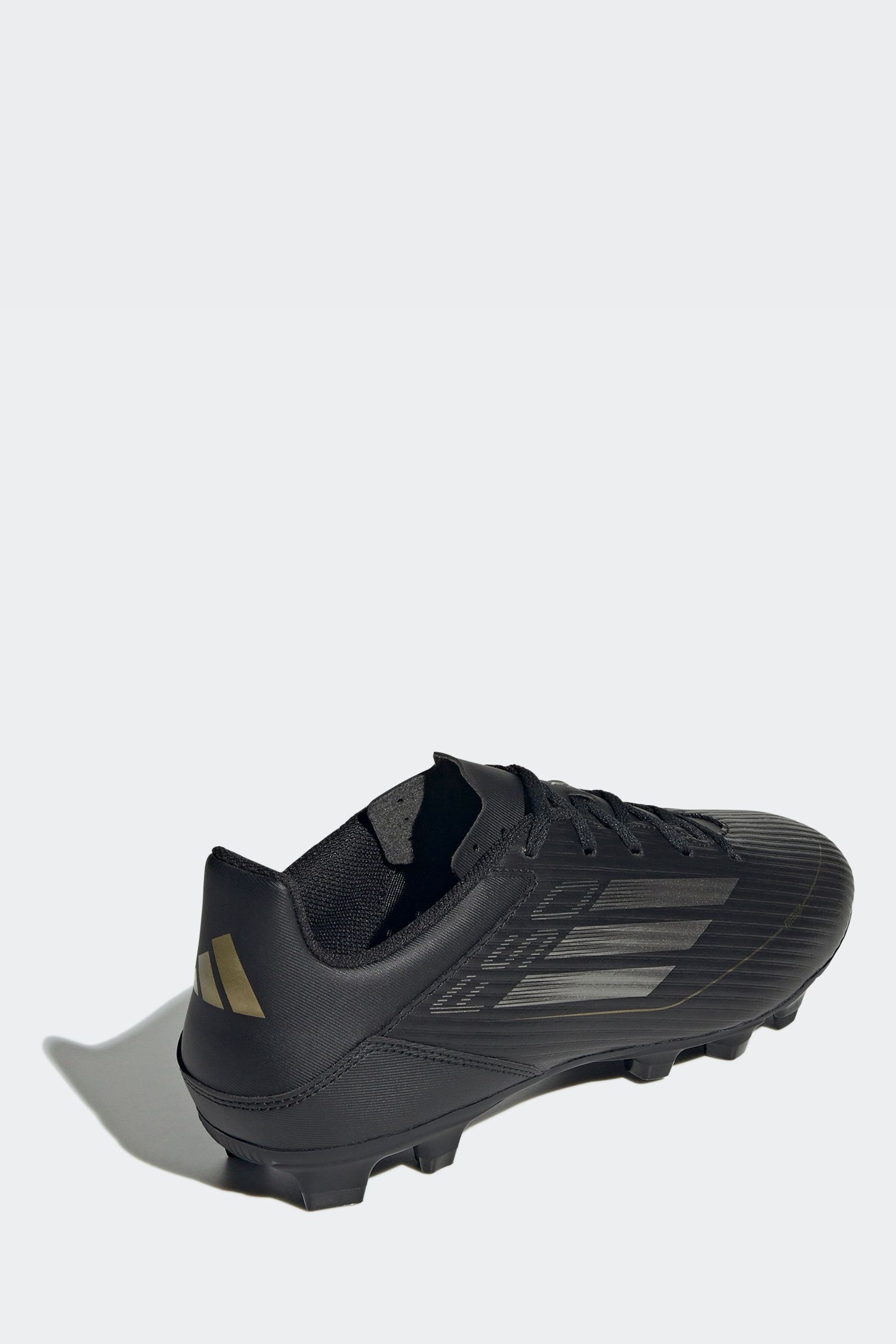 Adidas black and gold boots store