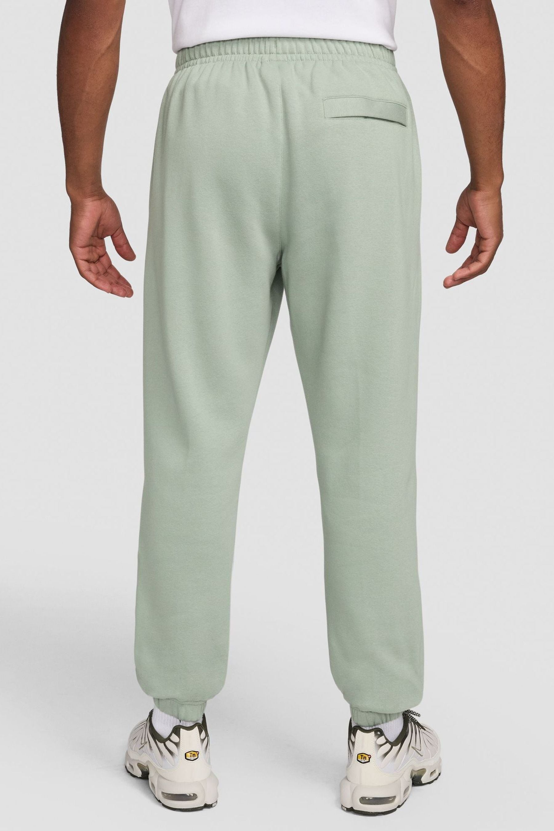 Buy Nike Green Club Cuffed Joggers from the Next UK online shop