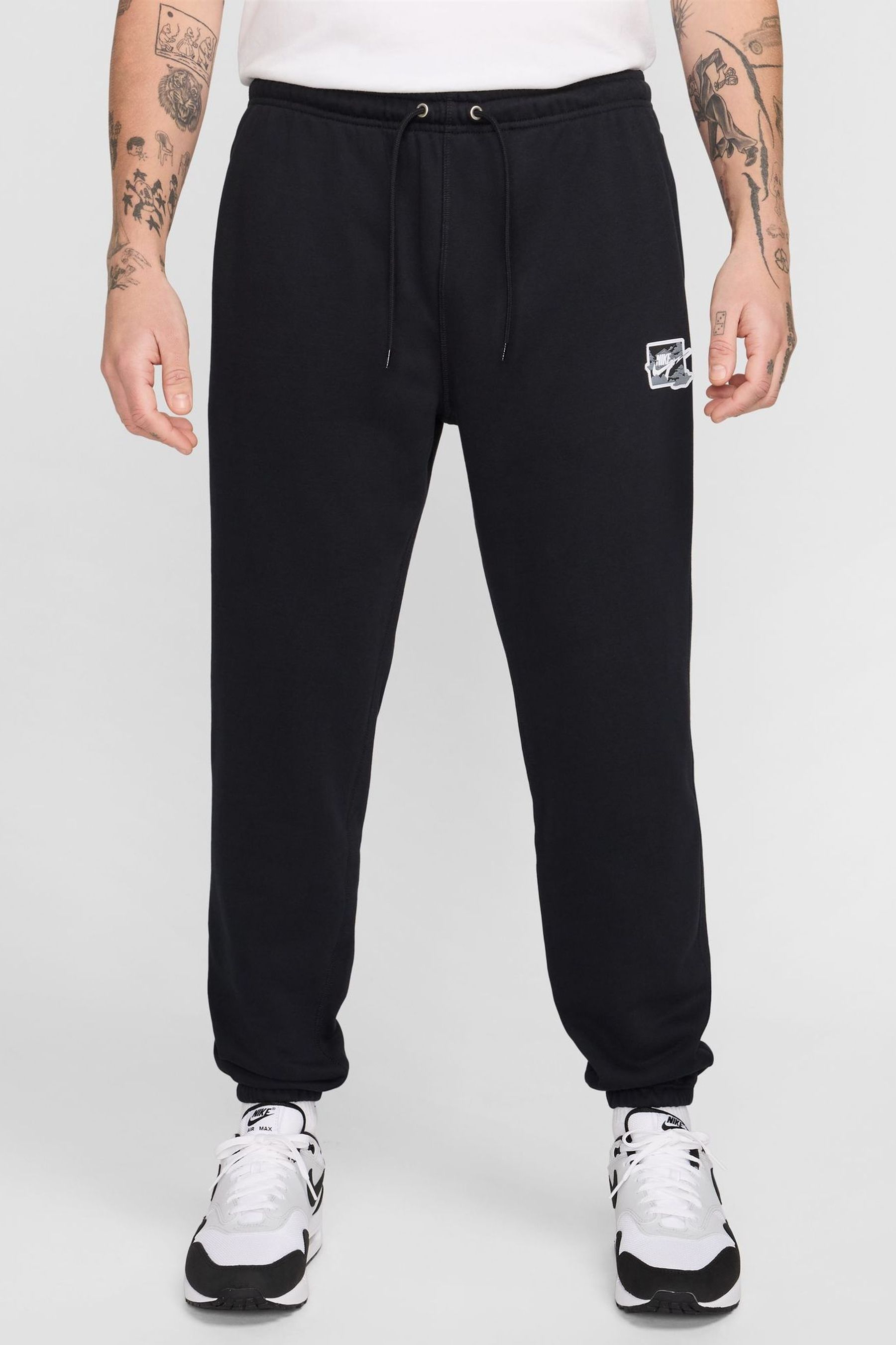 Buy Nike Black M Nk Club Ft Cuff Pant Bolt Joggers from the Next UK online shop