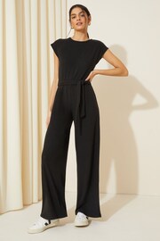 Friends Like These Black Petite Tie Belt Cosy Knit Rolled Sleeve Jumpsuit - Image 1 of 4