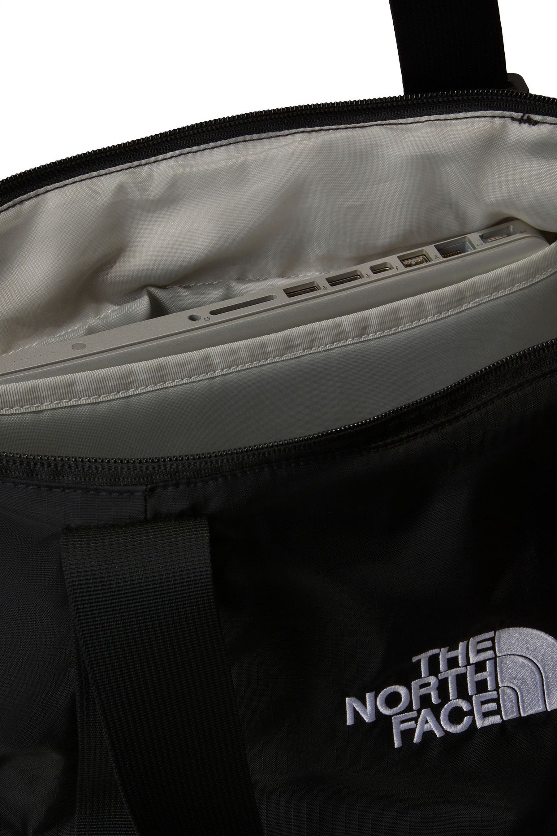 The north face explore utility tote bag in black outlet
