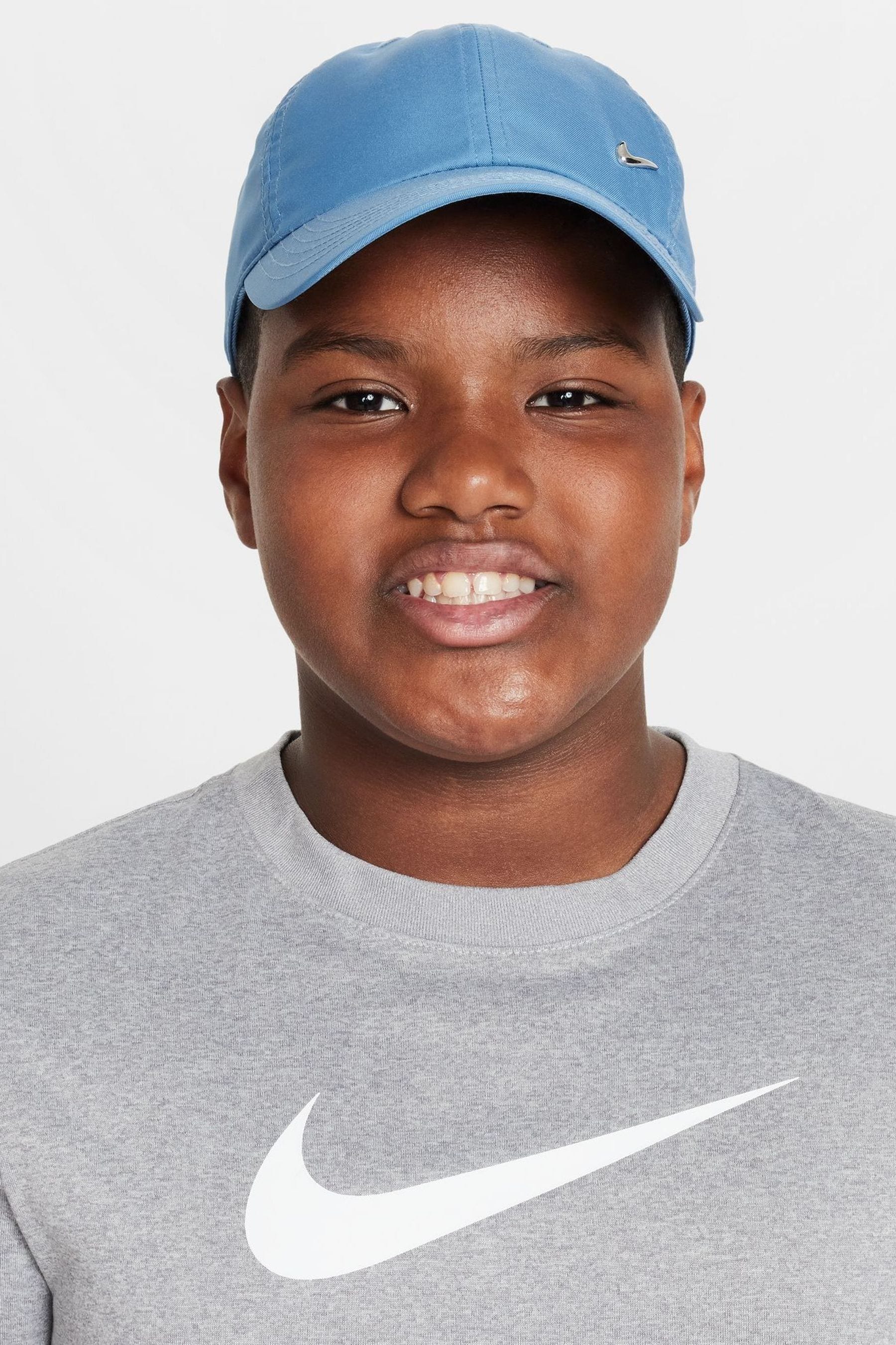 Buy Nike Blue Club Kids Dri FIT Unstructured Metal Swoosh Cap from Next Switzerland