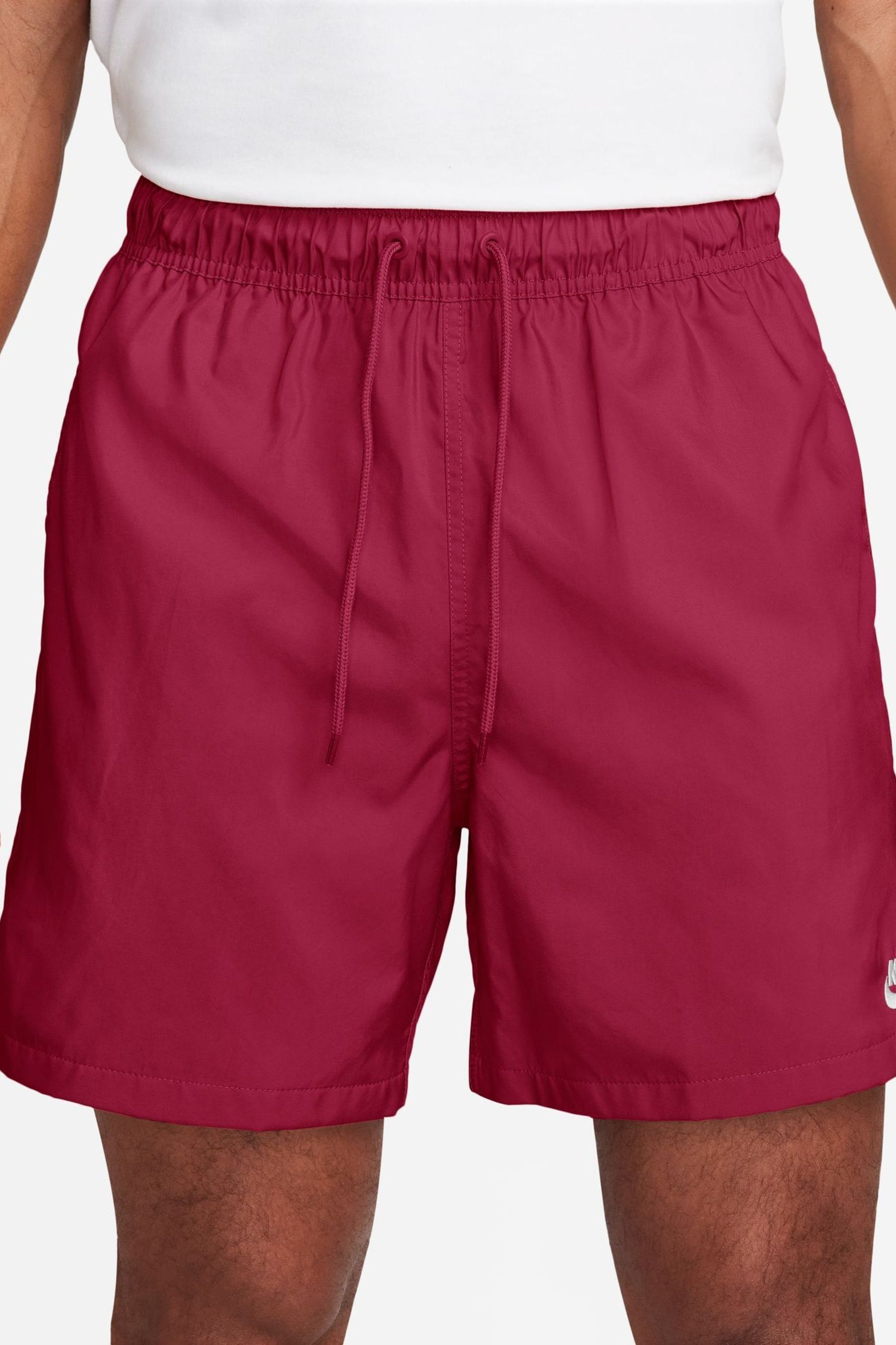 Buy Nike Team Red Club Woven Flow Shorts from the Next UK online shop
