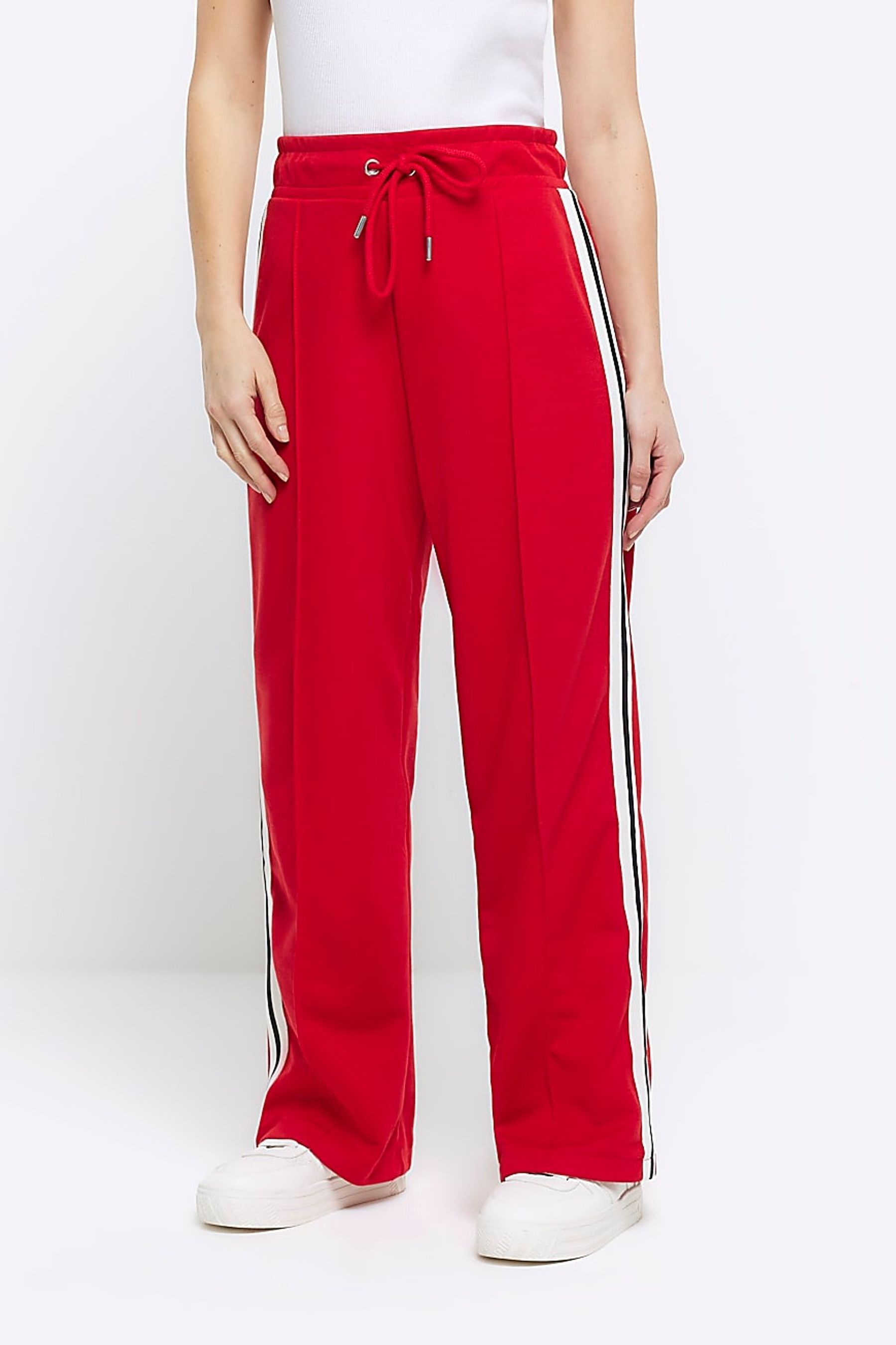 Buy River Island Red Petite Wide Leg Side Stripe Joggers from Next Luxembourg