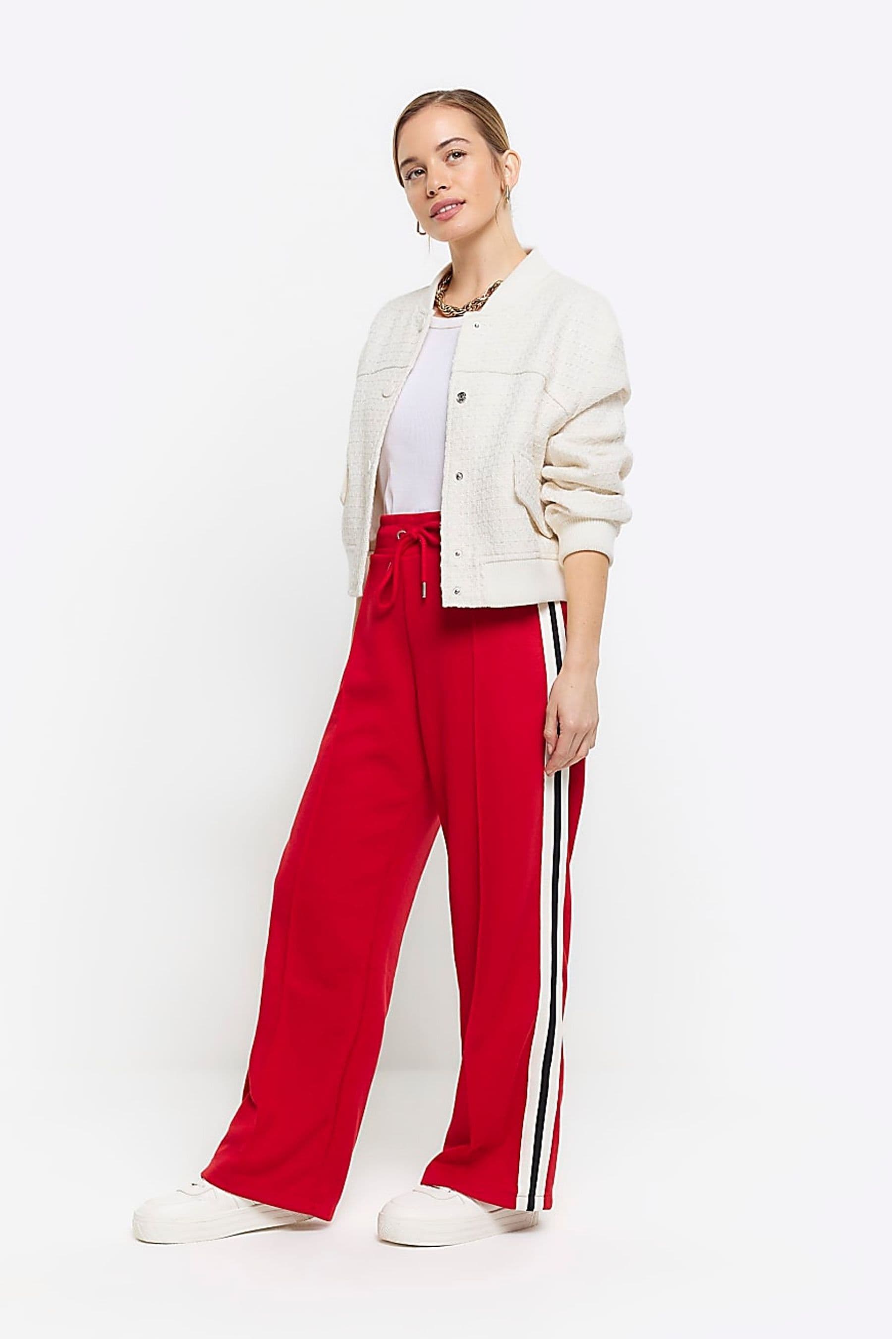 Buy River Island Red Petite Wide Leg Side Stripe Joggers from Next United Arab Emirates