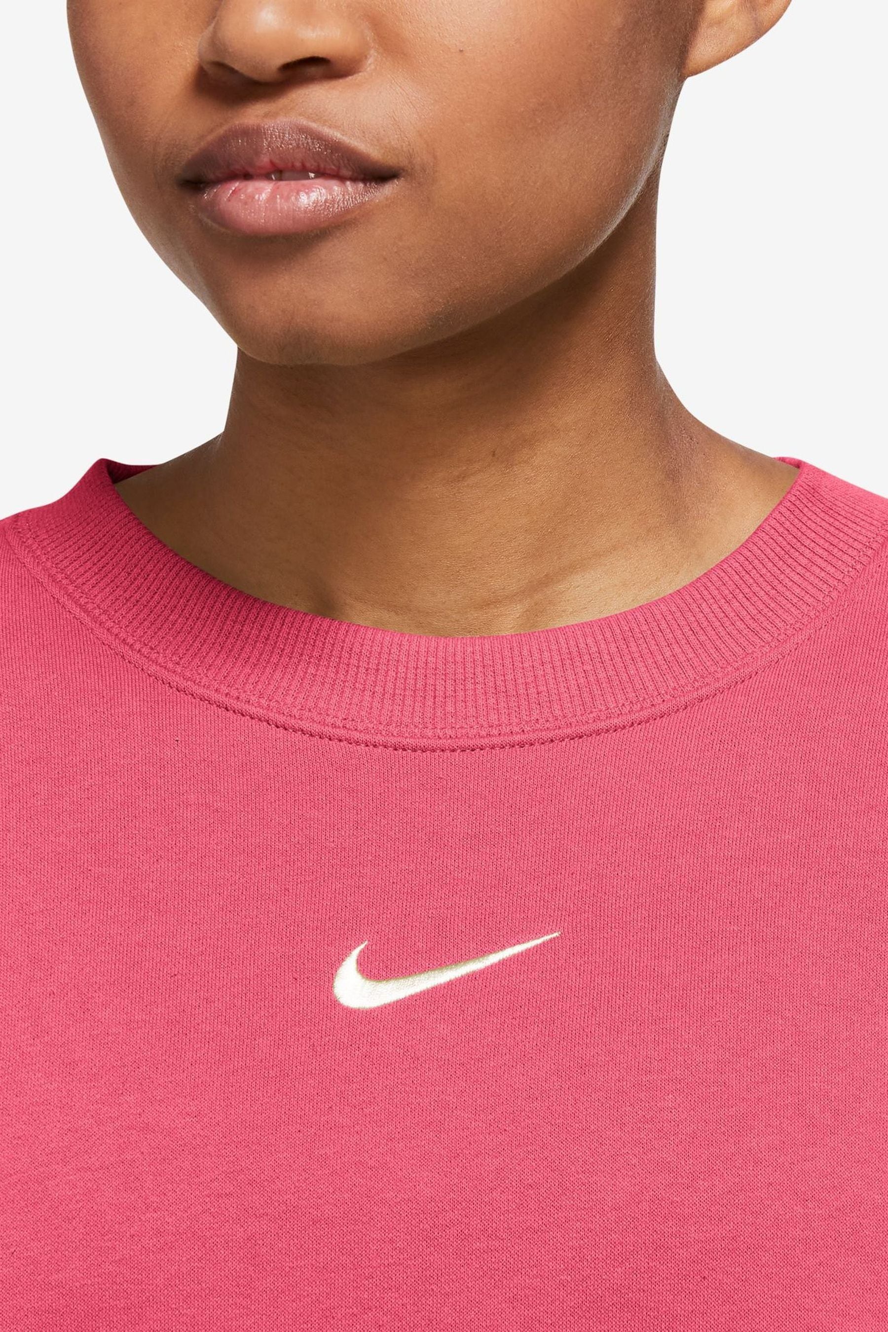 Buy Nike Pink Phoenix Fleece Oversized Mini Swoosh Crew Neck Sweatshirt from Next Luxembourg