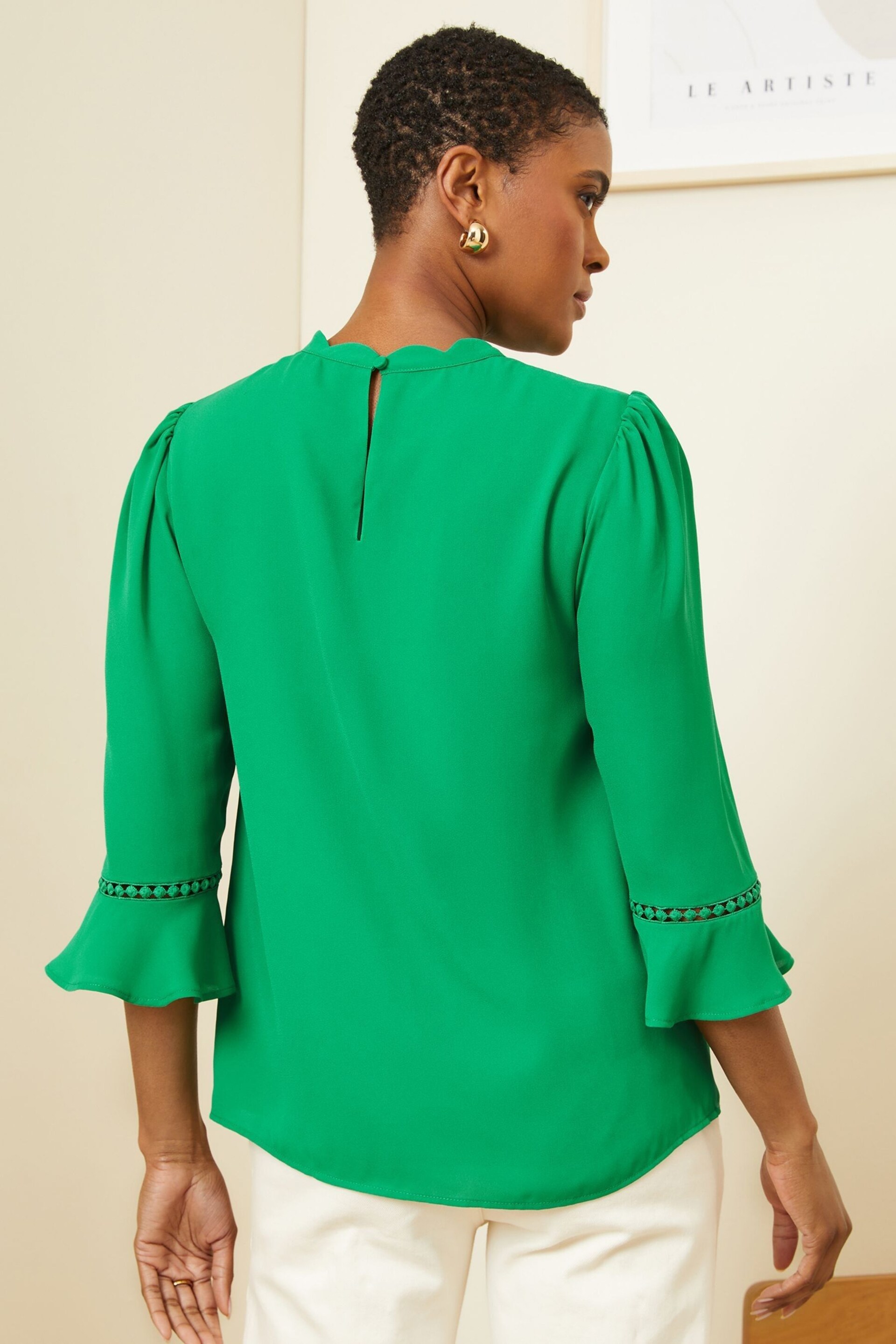 Love & Roses Green Scallop Pintuck Flute Sleeve Blouse - Image 3 of 4