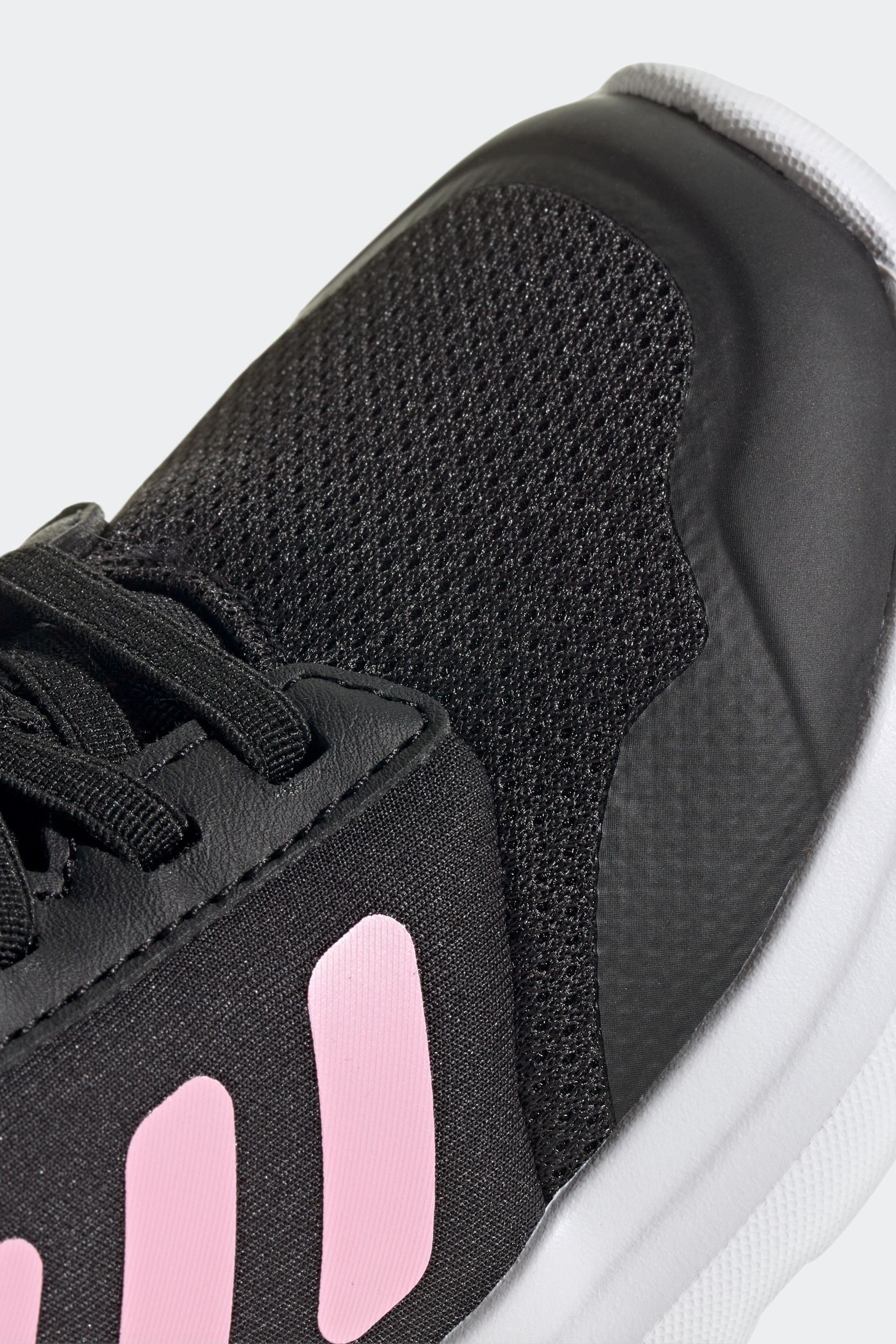 Black adidas with pink soles hotsell