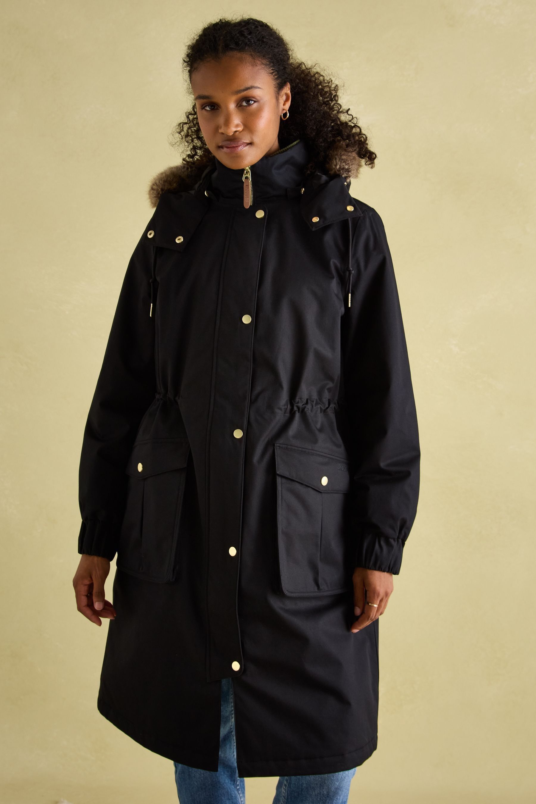 Buy Joules Harpsden Cosy Black Waterproof Fleece Lined Raincoat with Faux Fur Hood from Next Canada