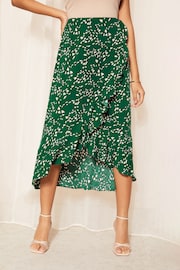 Friends Like These Green Ruffle Front Tie Waist Midi Skirt - Image 1 of 4