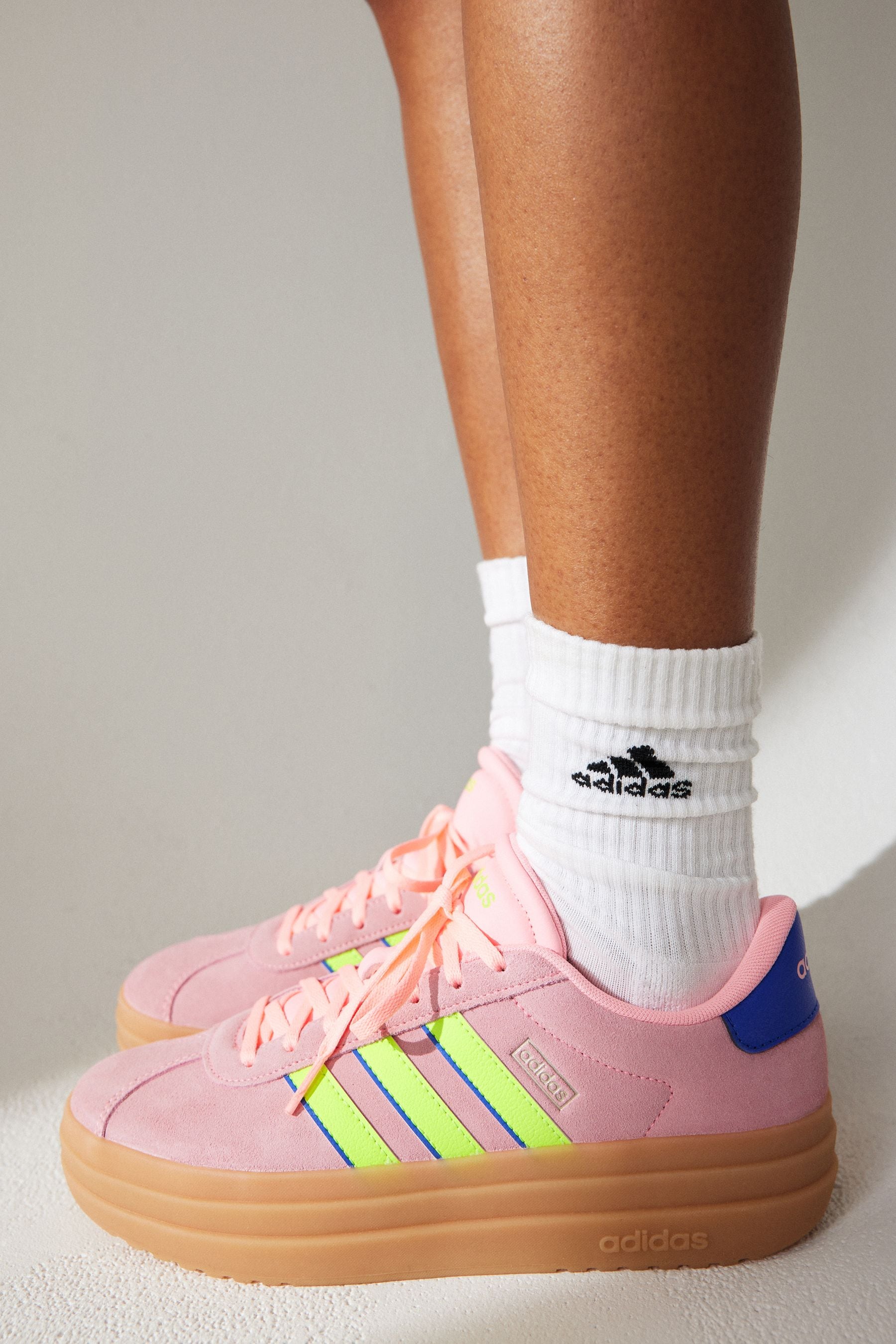 High top adidas pink cheap