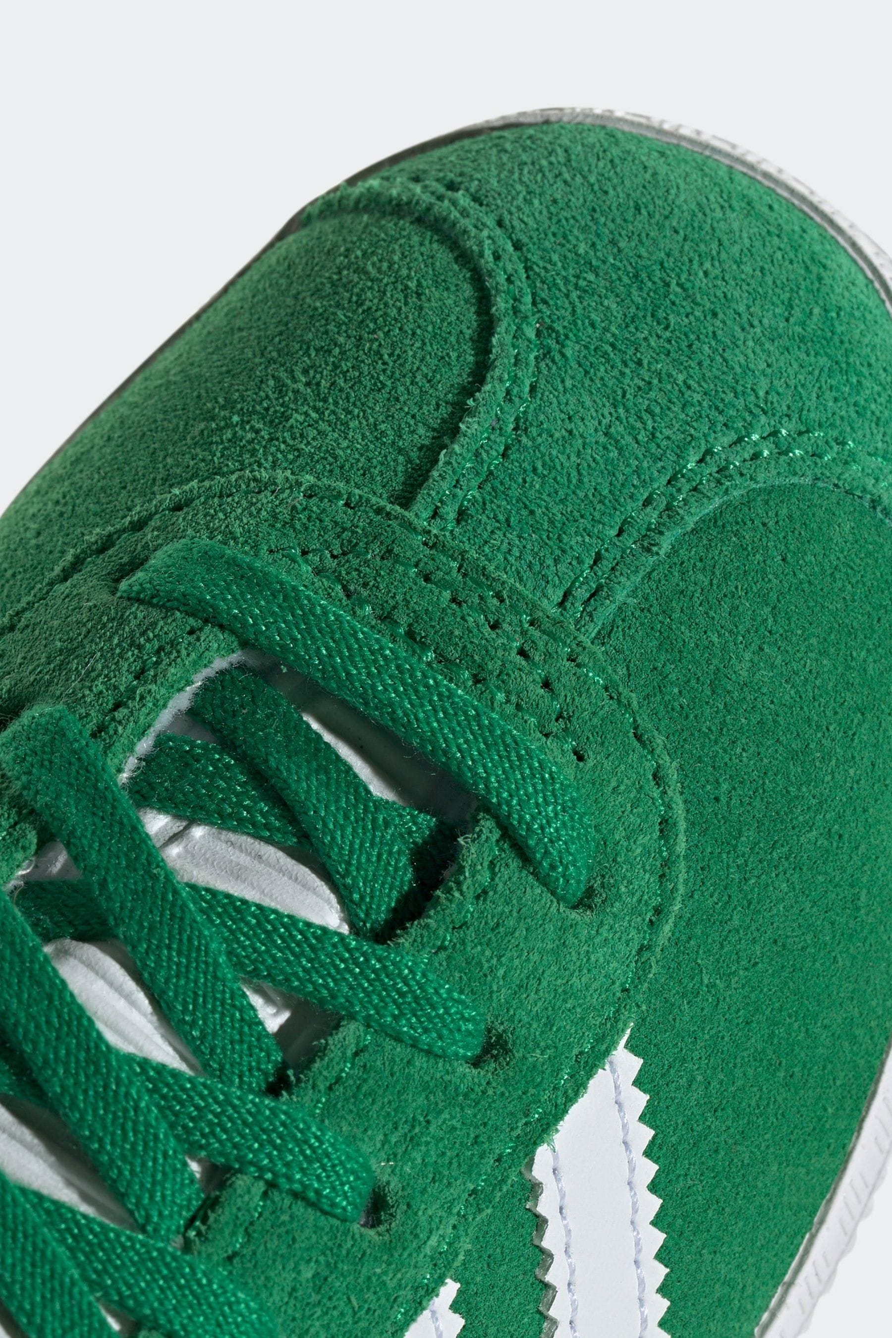 Buy adidas original Green Kids Gazelle Trainers from Next USA