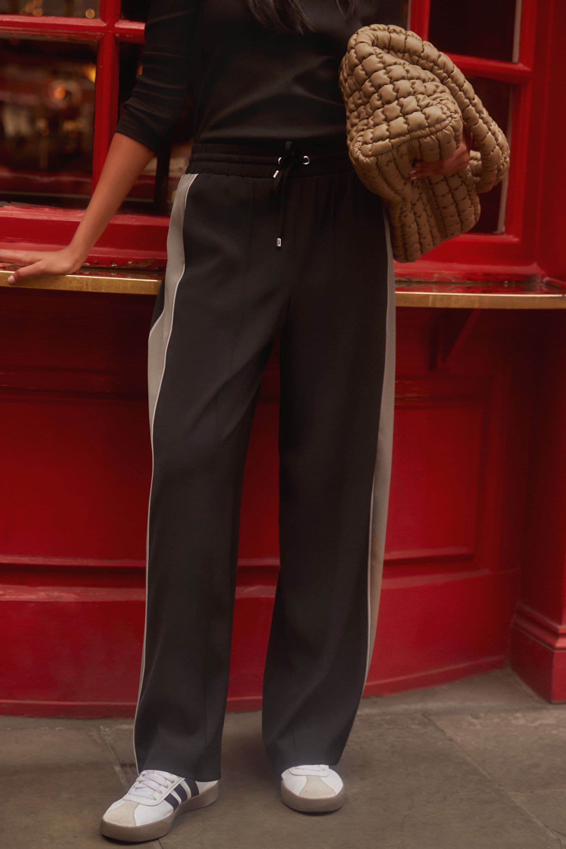 Black striped track pants sale