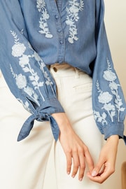 Love & Roses Blue TENCEL™ Embroidered Button Through V Neck Tie Cuff Shirt - Image 4 of 4