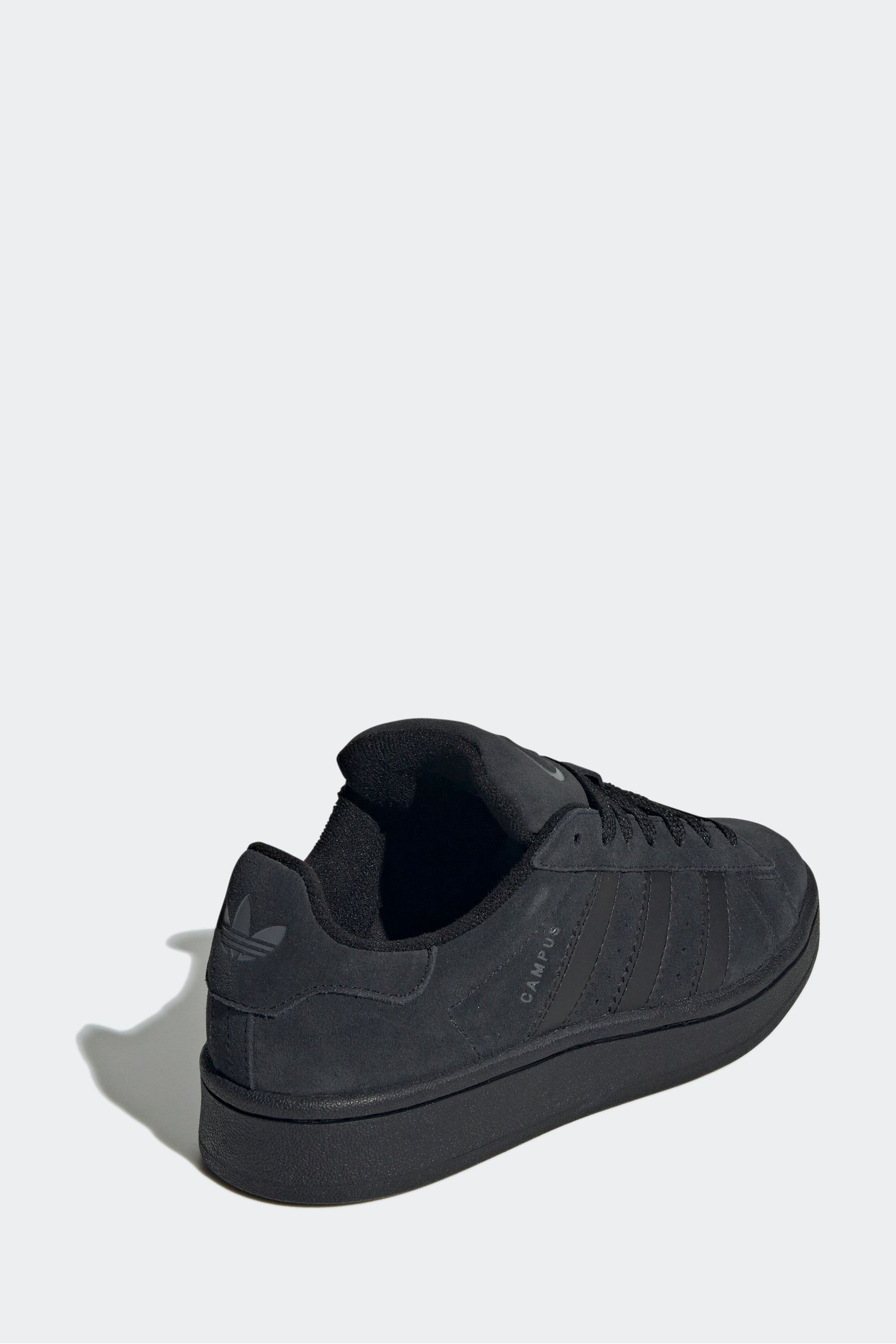Black suede adidas trainers top