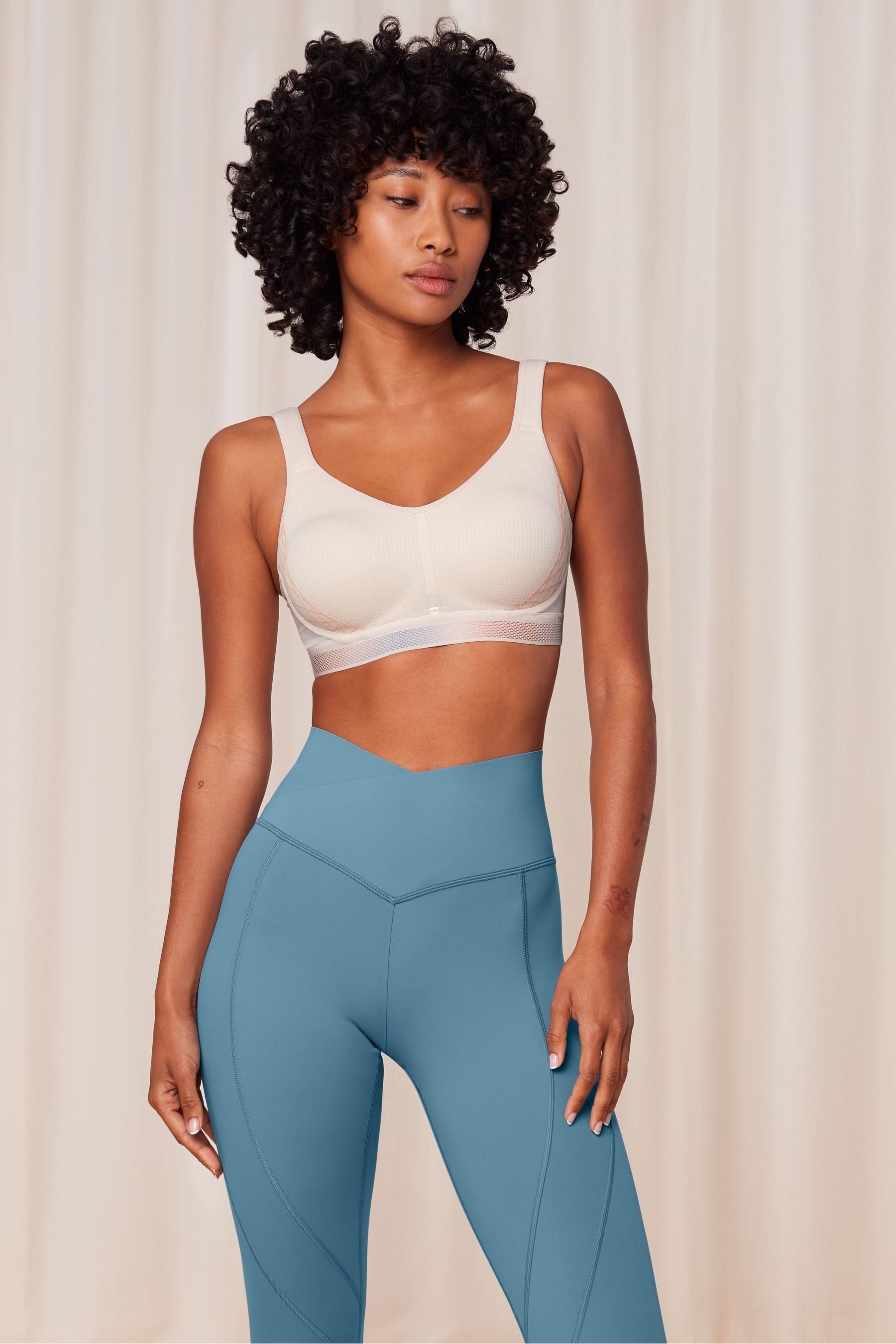 Buy Triumph Orange Cardio Flow Padded Sports Bra from the Next UK online shop