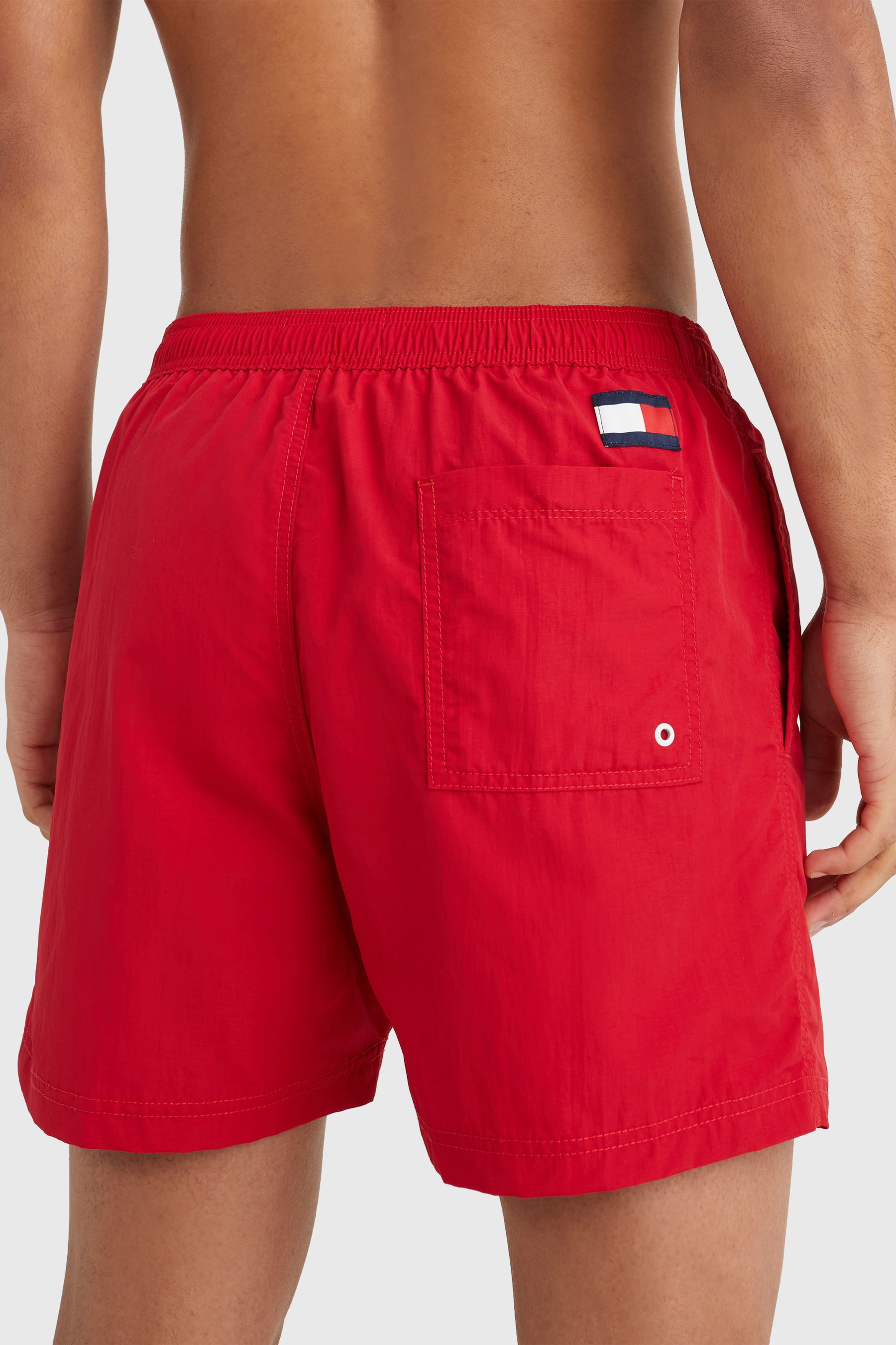 Buy Tommy Hilfiger Red Mens Solid Flag Swim Shorts from Next Canada