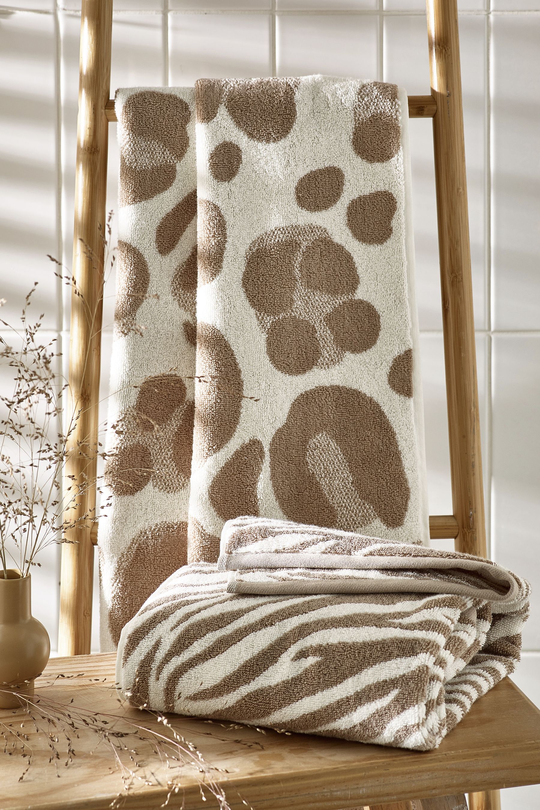 Buy Natural Animal Print Towels from Next Luxembourg