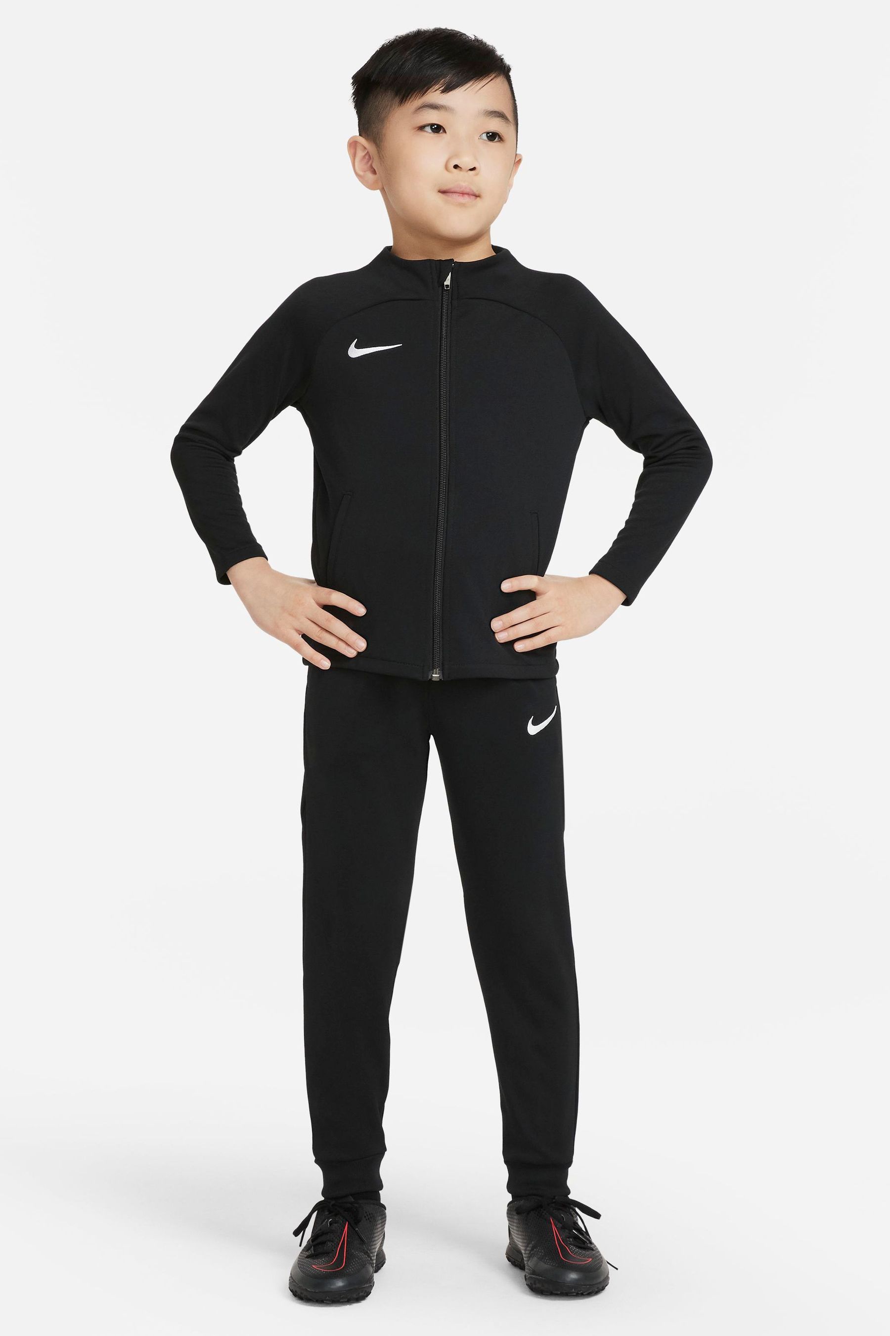 Nike black tracksuit kids hotsell