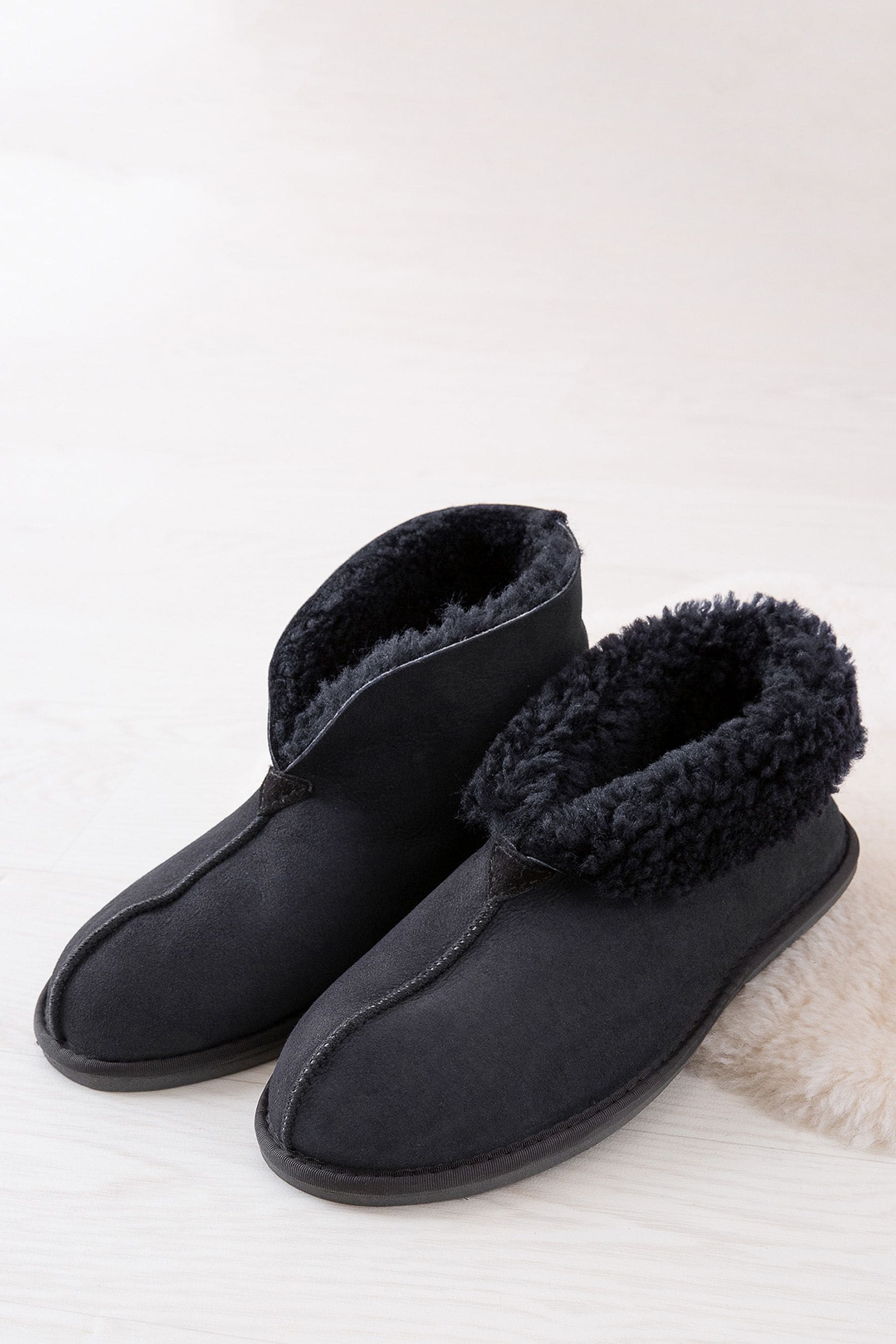 Buy Celtic Co Blue Sheepskin Bootee Slippers from Next Luxembourg