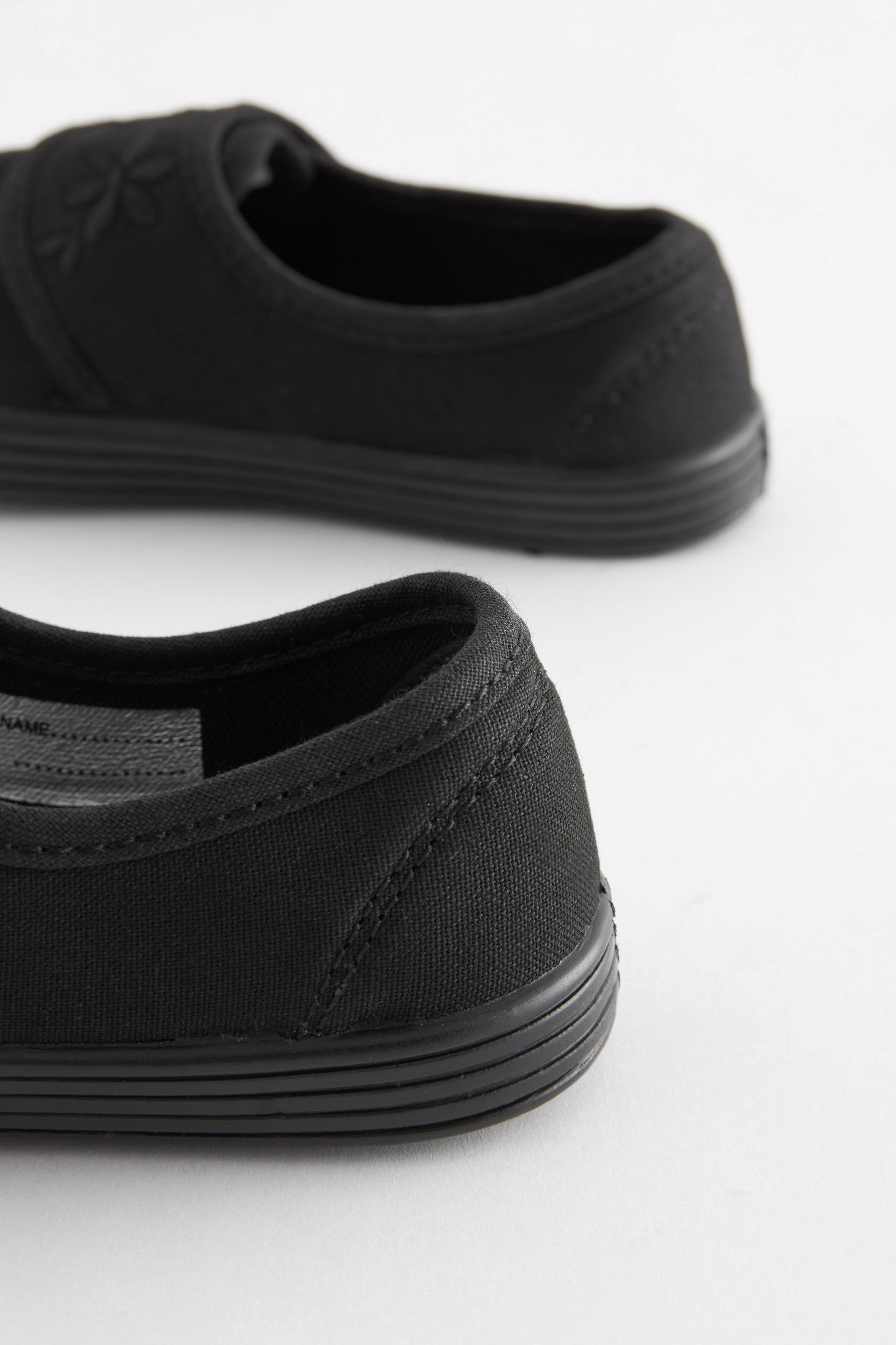 Buy Black Wide Fit G Embroidered Strap School Plimsolls from the Next UK online shop