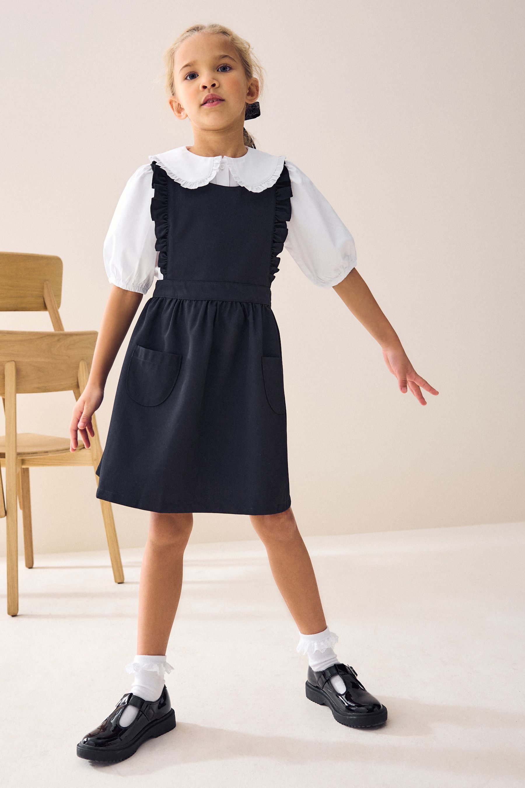 Navy pinafore school dress store