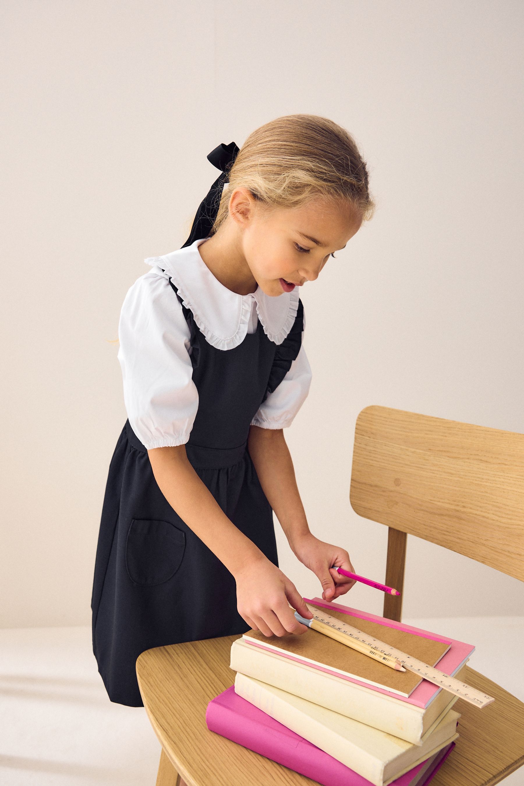 Blue pinafore dress school top