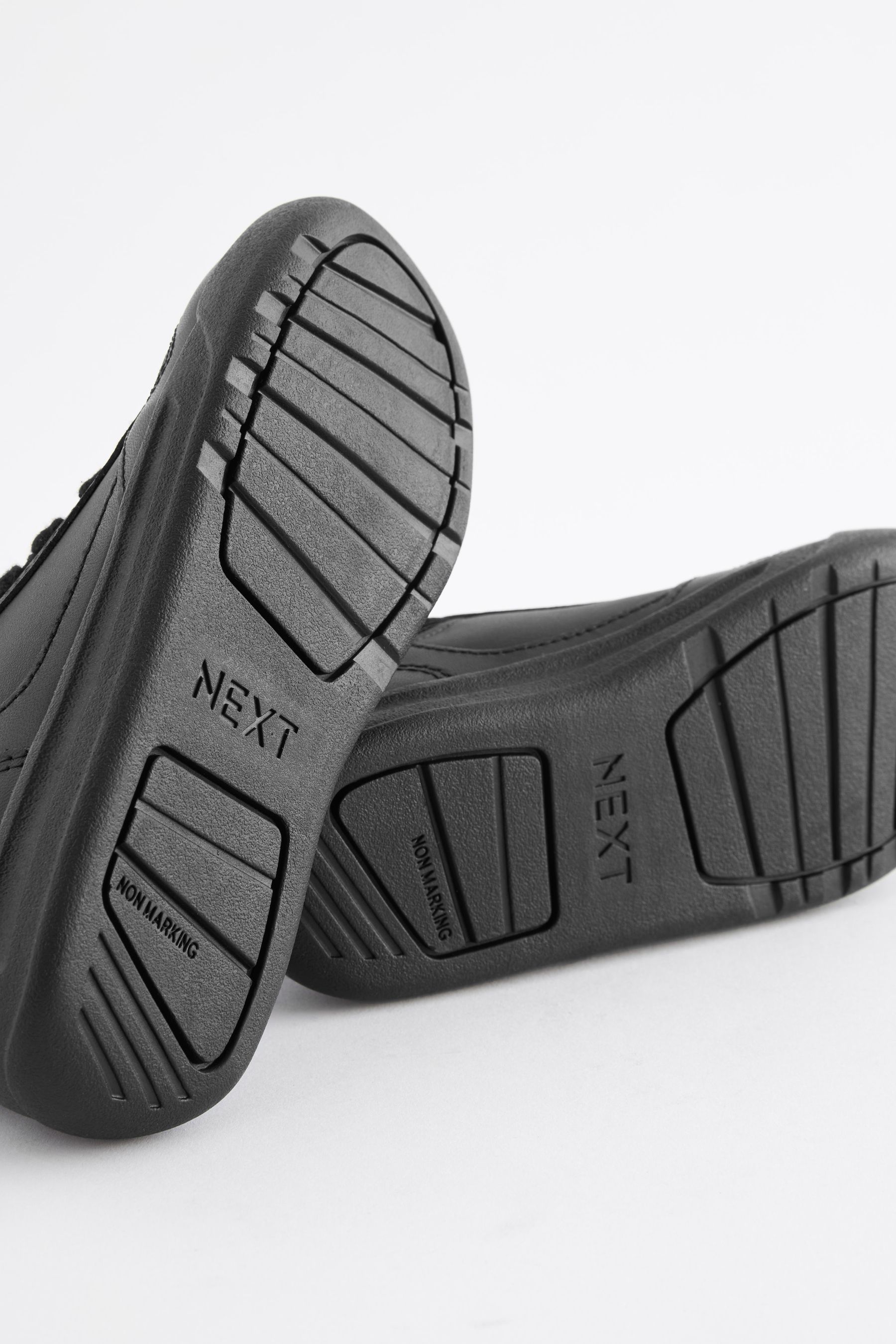 Next black trainers top
